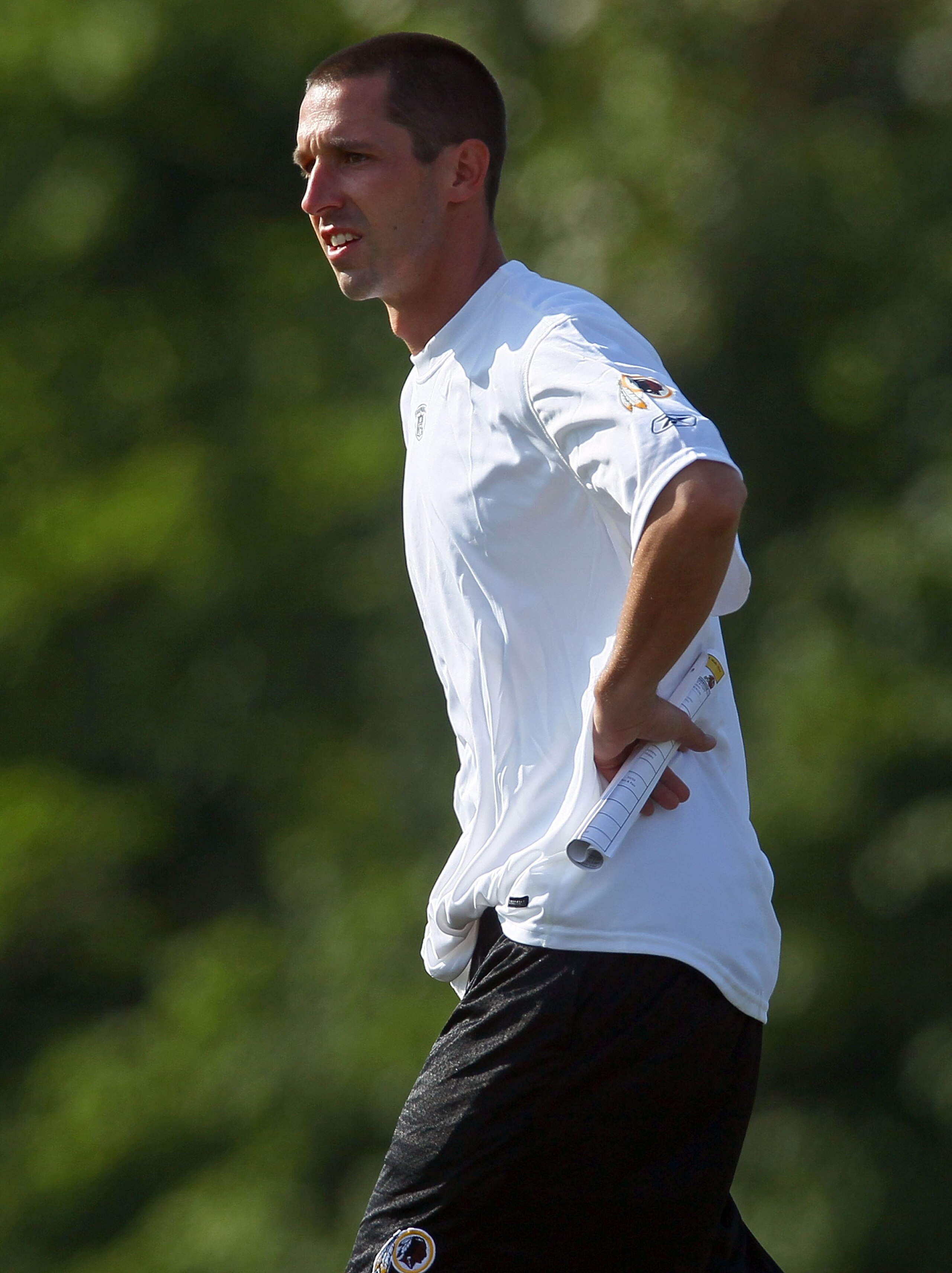 ASHBURN, VA - JULY 30:  Offensive coordinator Kyle Shanahan of the Washington Redskins watches drills during the second day of training camp July 30, 2010 in Ashburn, Virginia.  (Photo by Win McNamee/Getty Images)