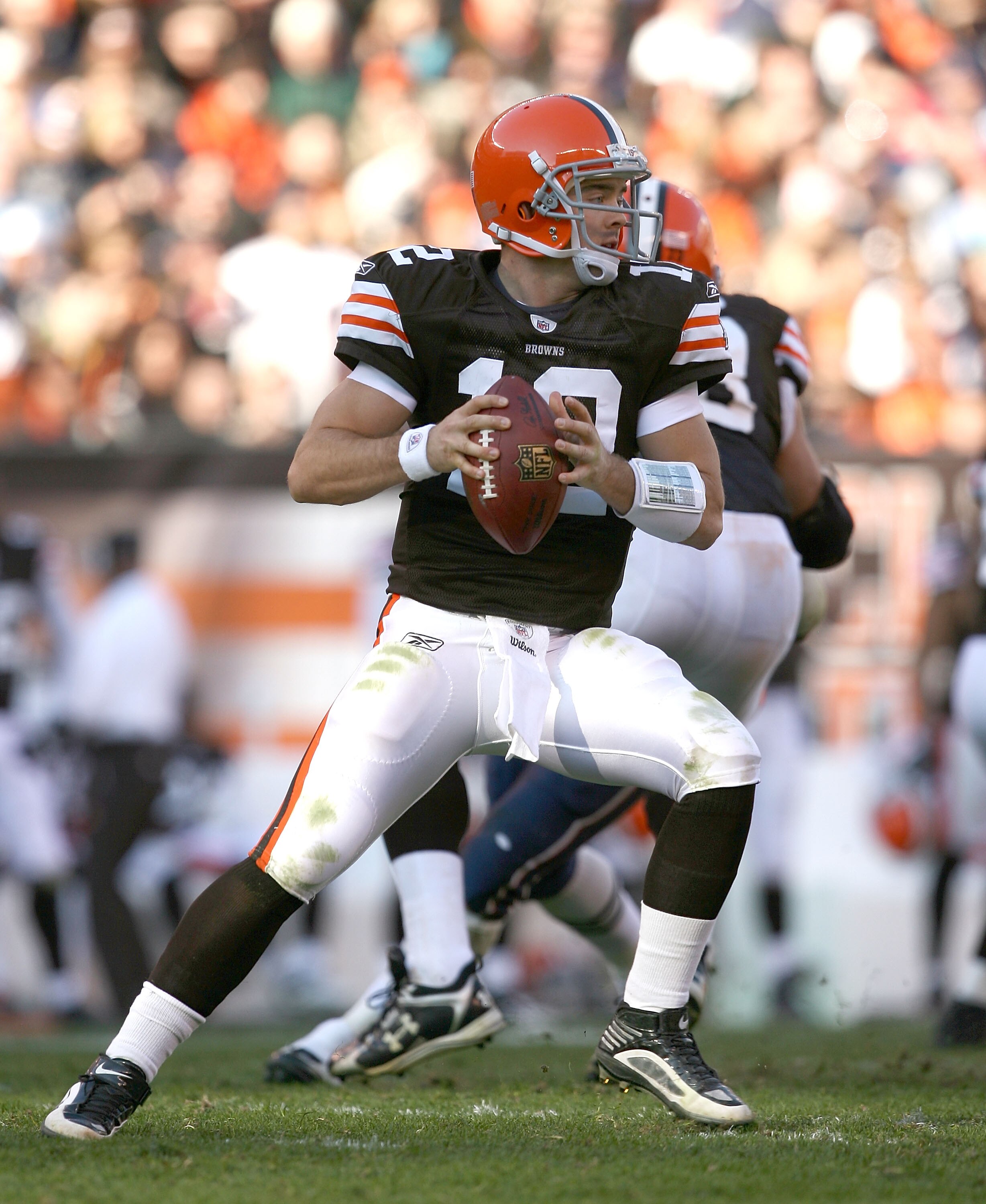 CLEVELAND - NOVEMBER 07:  Quarterback Colt McCoy #12 of the Cleveland Browns throws to a receiver against the New England Patriots at Cleveland Browns Stadium on November 7, 2010 in Cleveland, Ohio.  (Photo by Matt Sullivan/Getty Images)