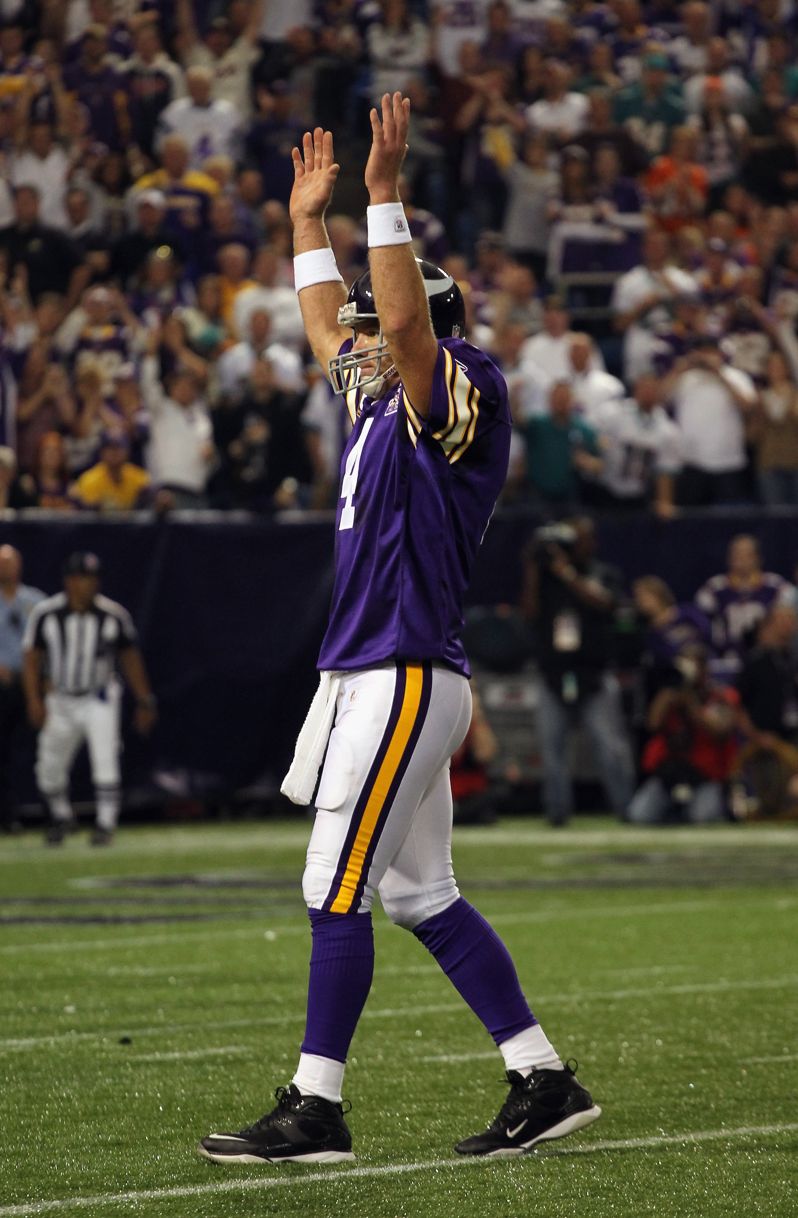 MINNEAPOLIS - SEPTEMBER 19:  Quarterback Brett Favre #4 of the Minnesota Vikings in action during the game against the Miami Dolphins on September 19, 2010 at Hubert H. Humphrey Metrodome in Minneapolis, Minnesota.  (Photo by Jamie Squire/Getty Images)