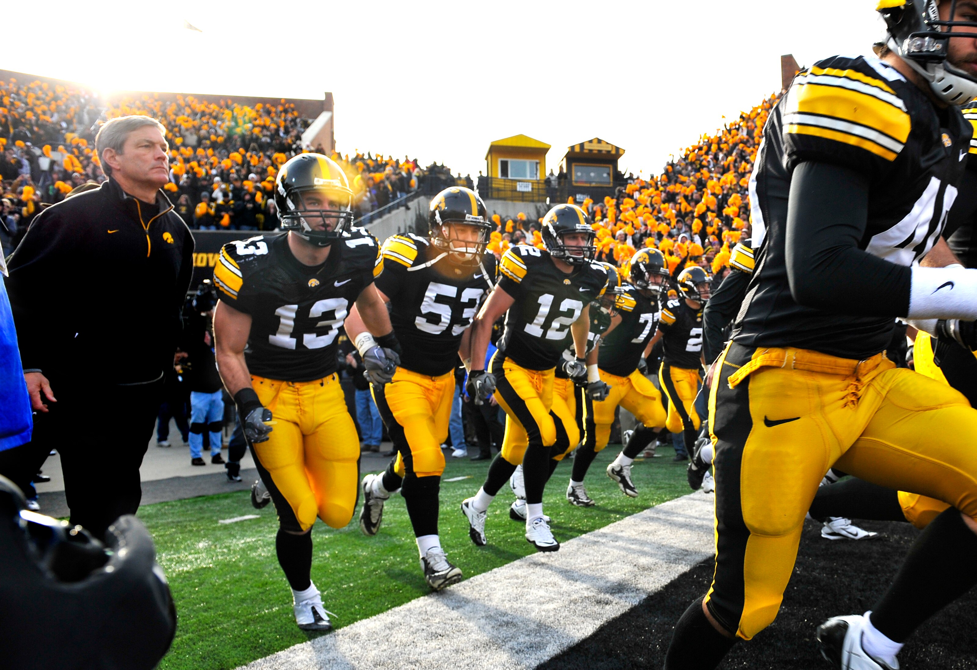 IOWA CITY, IA - NOVEMBER 20:  University of Iowa Hawkeyes head coach Kirk Ferentz takes the field with his team for the Ohio State Buckeyes NCAA college football game at Kinnick Stadium on November 20, 2010 in Iowa City, Iowa. Ohio State won 20-17 over Io