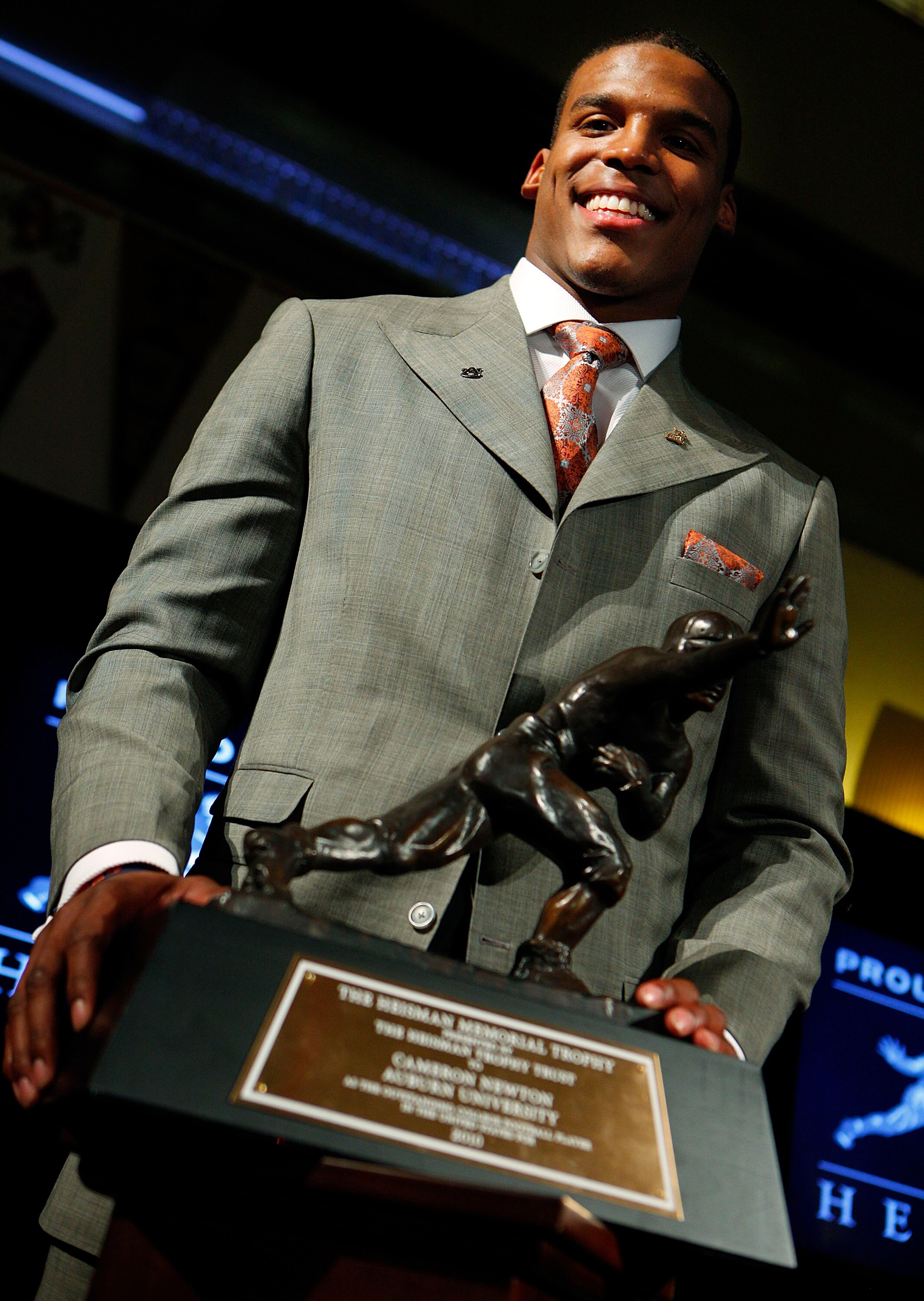 NEW YORK - DECEMBER 11:  Cam Newton, quarterback of the Auburn University Tigers, speaks after being awarded the 2010 Heisman Memorial Trophy Award on December 11, 2010 in New York City.  (Photo by Jeff Zelevansky/Getty Images)