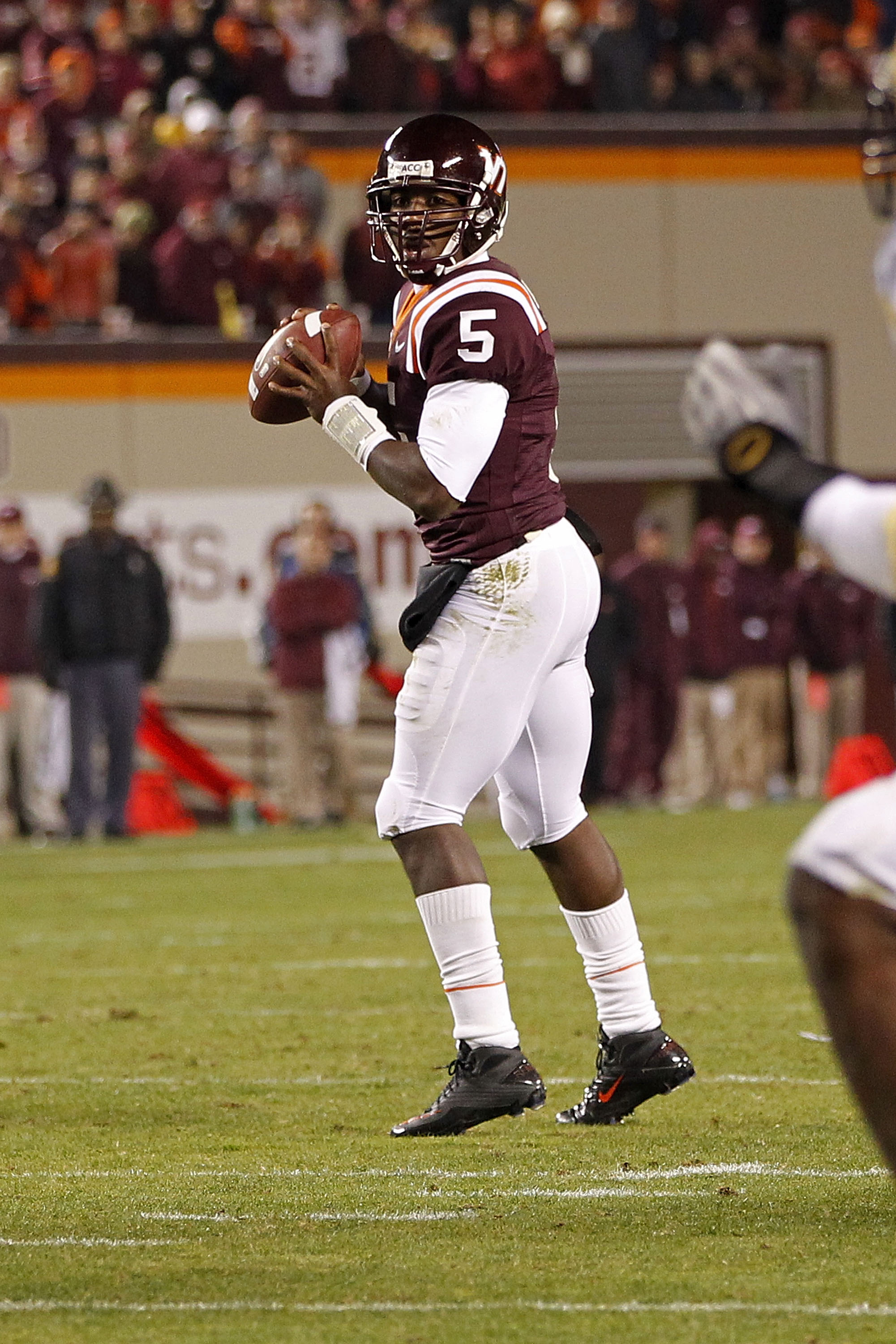 BLACKSBURG, VA - NOVEMBER 04:  Quarterback Tyrod Taylor #5 of the Virginia Tech Hokies prepares to throw the ball against the Georgia Tech Yellow Jackets at Lane Stadium on November 4, 2010 in Blacksburg, Virginia.  (Photo by Geoff Burke/Getty Images)