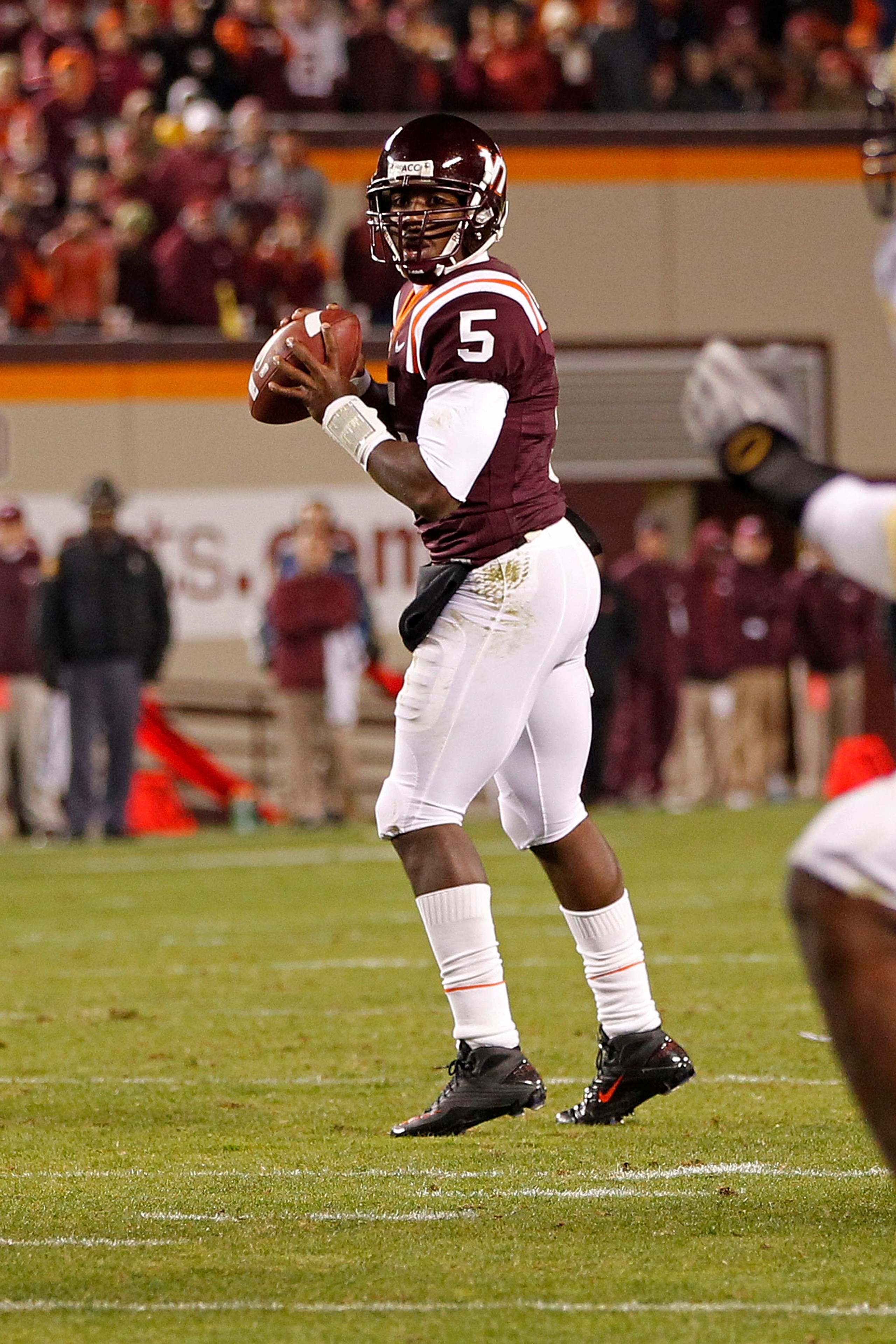 BLACKSBURG, VA - NOVEMBER 04:  Quarterback Tyrod Taylor #5 of the Virginia Tech Hokies prepares to throw the ball against the Georgia Tech Yellow Jackets at Lane Stadium on November 4, 2010 in Blacksburg, Virginia.  (Photo by Geoff Burke/Getty Images)