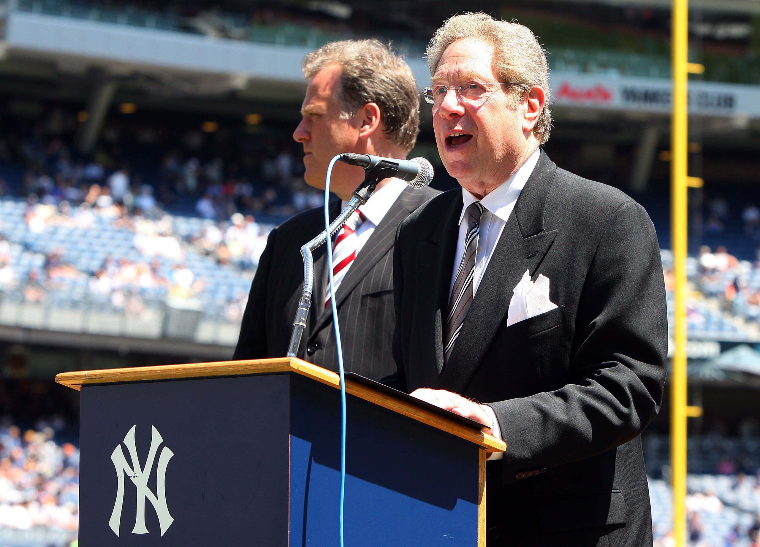 NEW YORK - JULY 19: New York Yankees radio broadcaster John Sterling speaks during the teams 63rd Old Timers Day before the game against the Detroit Tigers on July 19, 2009 at Yankee Stadium in the Bronx borough of New York City. (Photo by Jim McIsaac/G NEW YORK - JULY 19: New York Yankees radio broadcaster John Sterling speaks during the teams 63rd Old Timers Day before the game against the Detroit Tigers on July 19, 2009 at Yankee Stadium in the Bronx borough of New York City. (Photo by Jim McIsaac/G