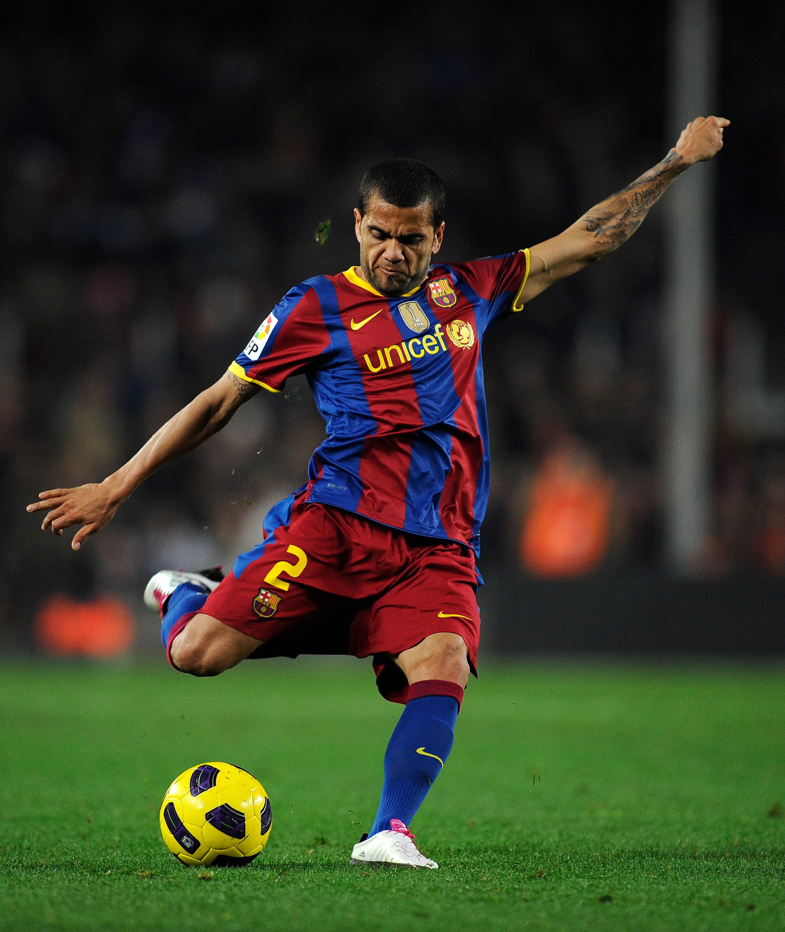 BARCELONA, SPAIN - DECEMBER 12:  Dani Alves of Barcelona shoots at goal during the La Liga match between Barcelona and Real Sociedad at Camp Nou Stadium on December 12, 2010 in Barcelona, Spain. Barcelona won 5-0.  (Photo by David Ramos/Getty Images)