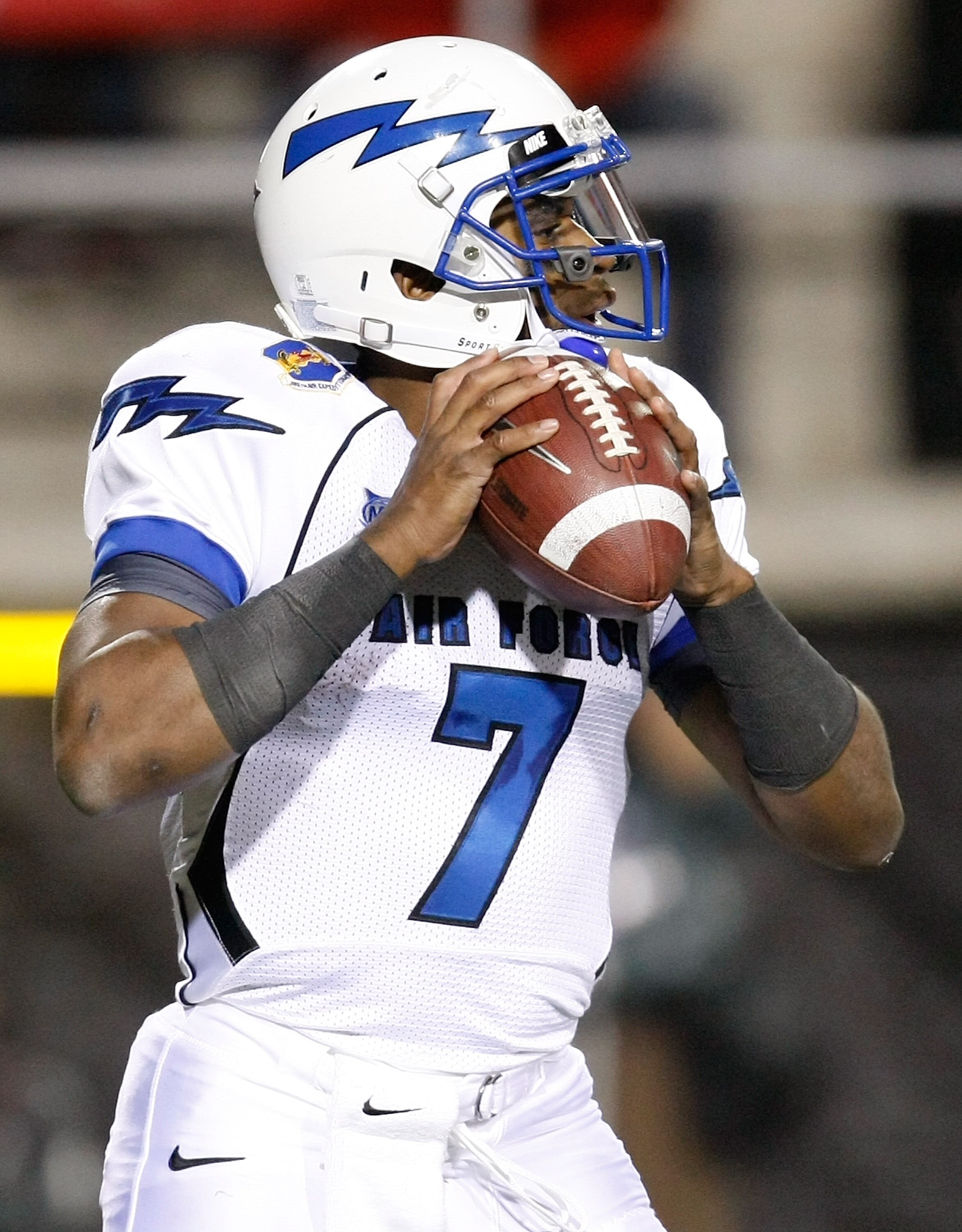 LAS VEGAS - NOVEMBER 18:  Quarterback Tim Jefferson Jr. #7 of the Air Force Falcons drops back to pass against the UNLV Rebels during their game at Sam Boyd Stadium November 18, 2010 in Las Vegas, Nevada. Air Force won 35-20.  (Photo by Ethan Miller/Getty