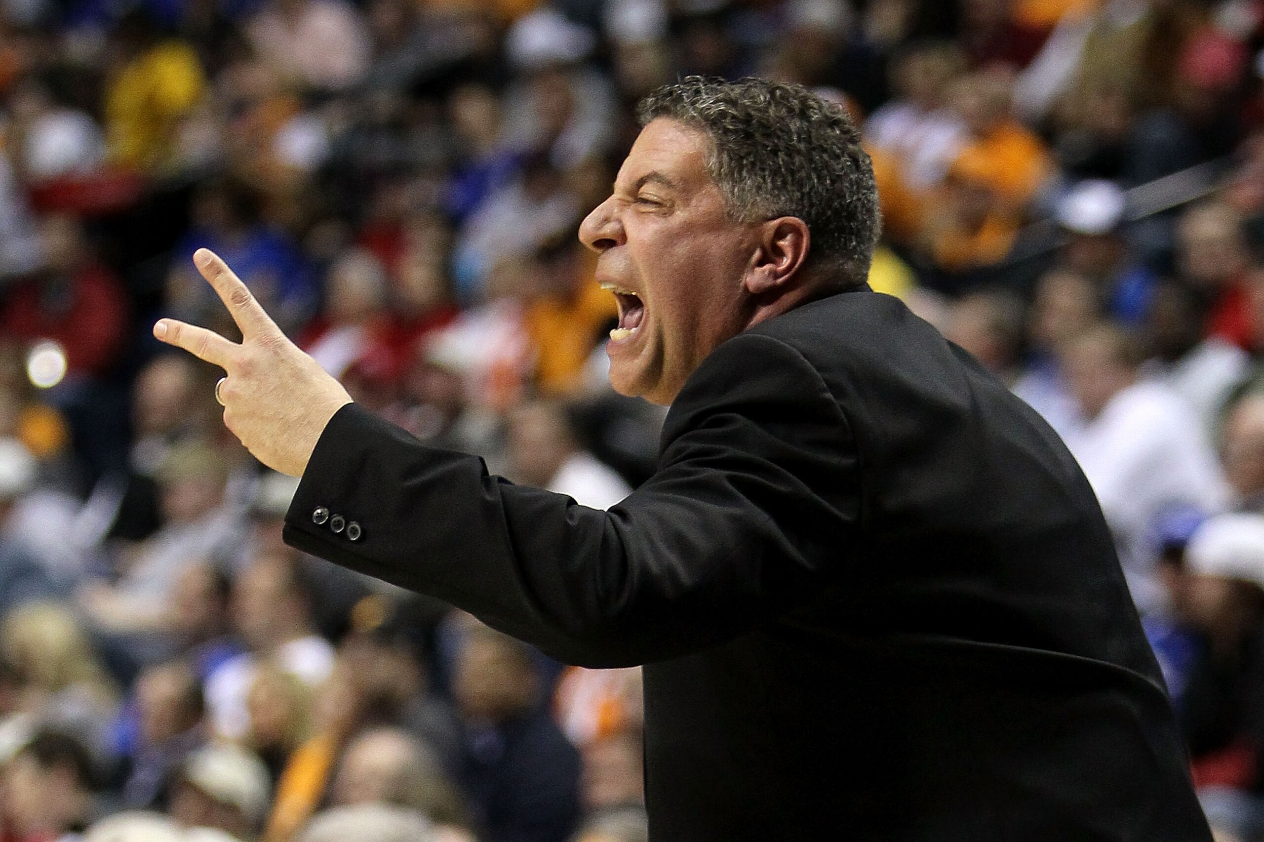 NASHVILLE, TN - MARCH 11:  Head coach Bruce Pearl of the Tennessee Volunteers reacts against the LSU Tigers during the first round of the SEC Men's Basketball Tournament at the Bridgestone Arena on March 11, 2010 in Nashville, Tennessee.  (Photo by Andy L