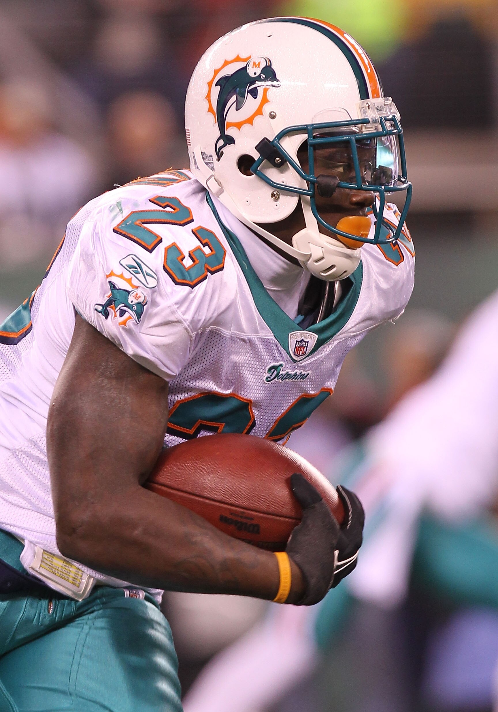 EAST RUTHERFORD, NJ - DECEMBER 12:  Ronnie Brown #23 of the Miami Dolphins rushes against the New York Jets at New Meadowlands Stadium on December 12, 2010 in East Rutherford, New Jersey.  (Photo by Nick Laham/Getty Images)