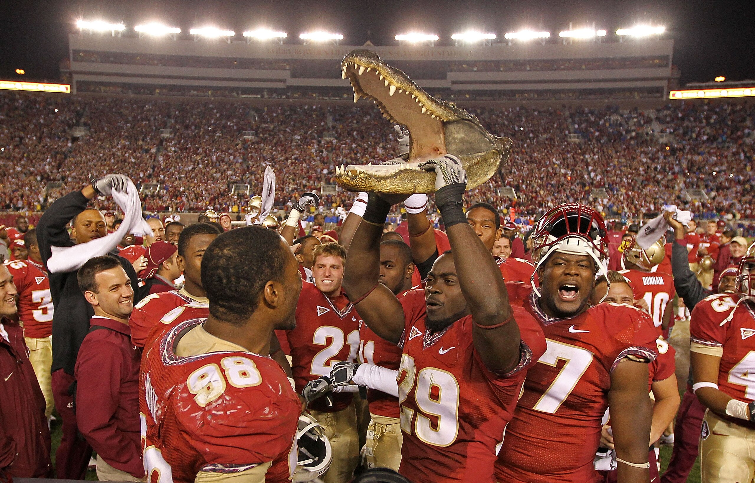 TALLAHASSEE, FL - NOVEMBER 27:  Chris Finn #29 of the Florida State Seminoles hold up a gator head to celebrate a win against the Florida Gators at Doak Campbell Stadium on November 27, 2010 in Tallahassee, Florida.  (Photo by Mike Ehrmann/Getty Images)