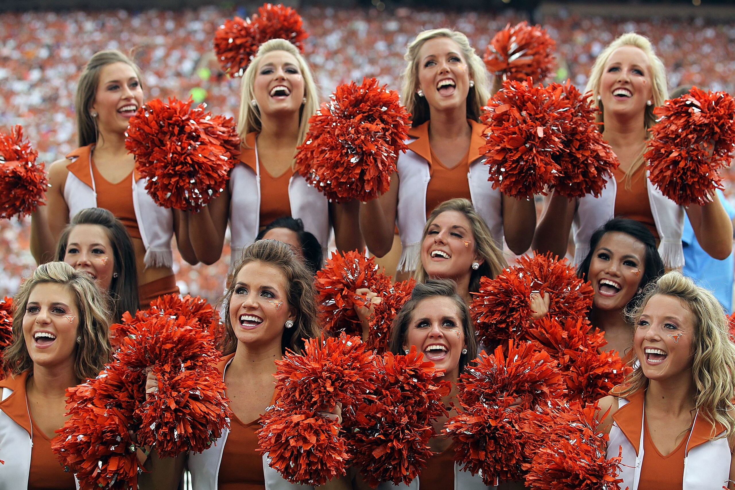 AUSTIN, TX - SEPTEMBER 25:  Members of the Texas Longhorns dance team at Darrell K Royal-Texas Memorial Stadium on September 25, 2010 in Austin, Texas.  (Photo by Ronald Martinez/Getty Images)
