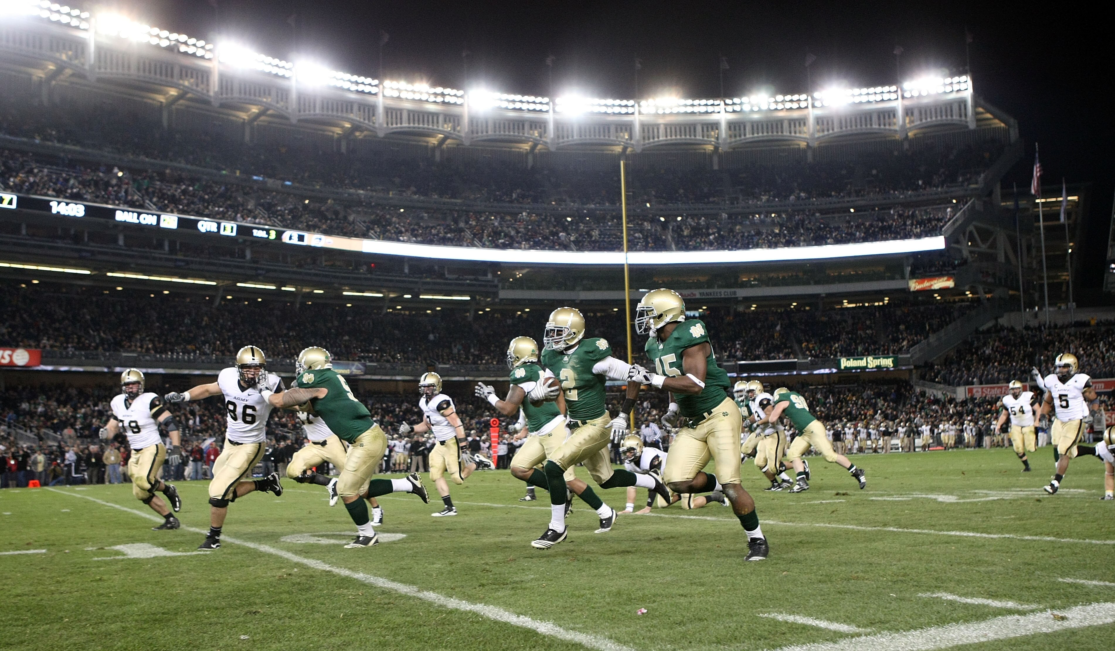 NEW YORK - NOVEMBER 20: Darrin Walls #2 of the Notre Dame Fighting Irish runs the ball in for a touchdown after an interception in the thrid quarter against the Army Black Knights at Yankee Stadium on November 20, 2010 in the Bronx borough of New York Cit