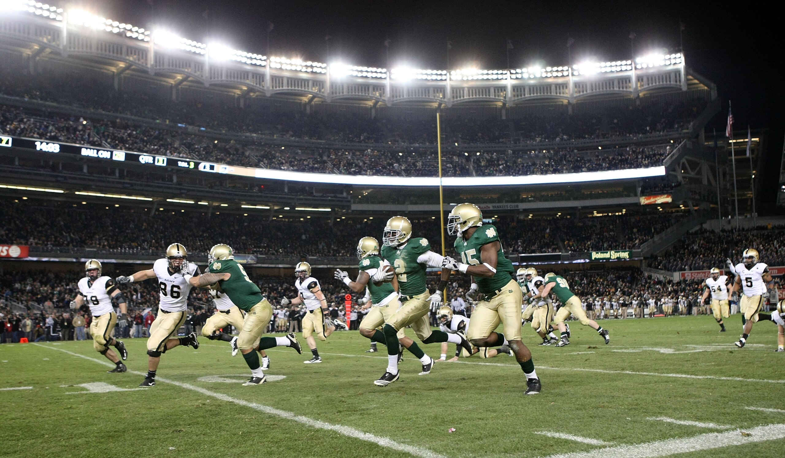 NEW YORK - NOVEMBER 20: Darrin Walls #2 of the Notre Dame Fighting Irish runs the ball in for a touchdown after an interception in the thrid quarter against the Army Black Knights at Yankee Stadium on November 20, 2010 in the Bronx borough of New York Cit