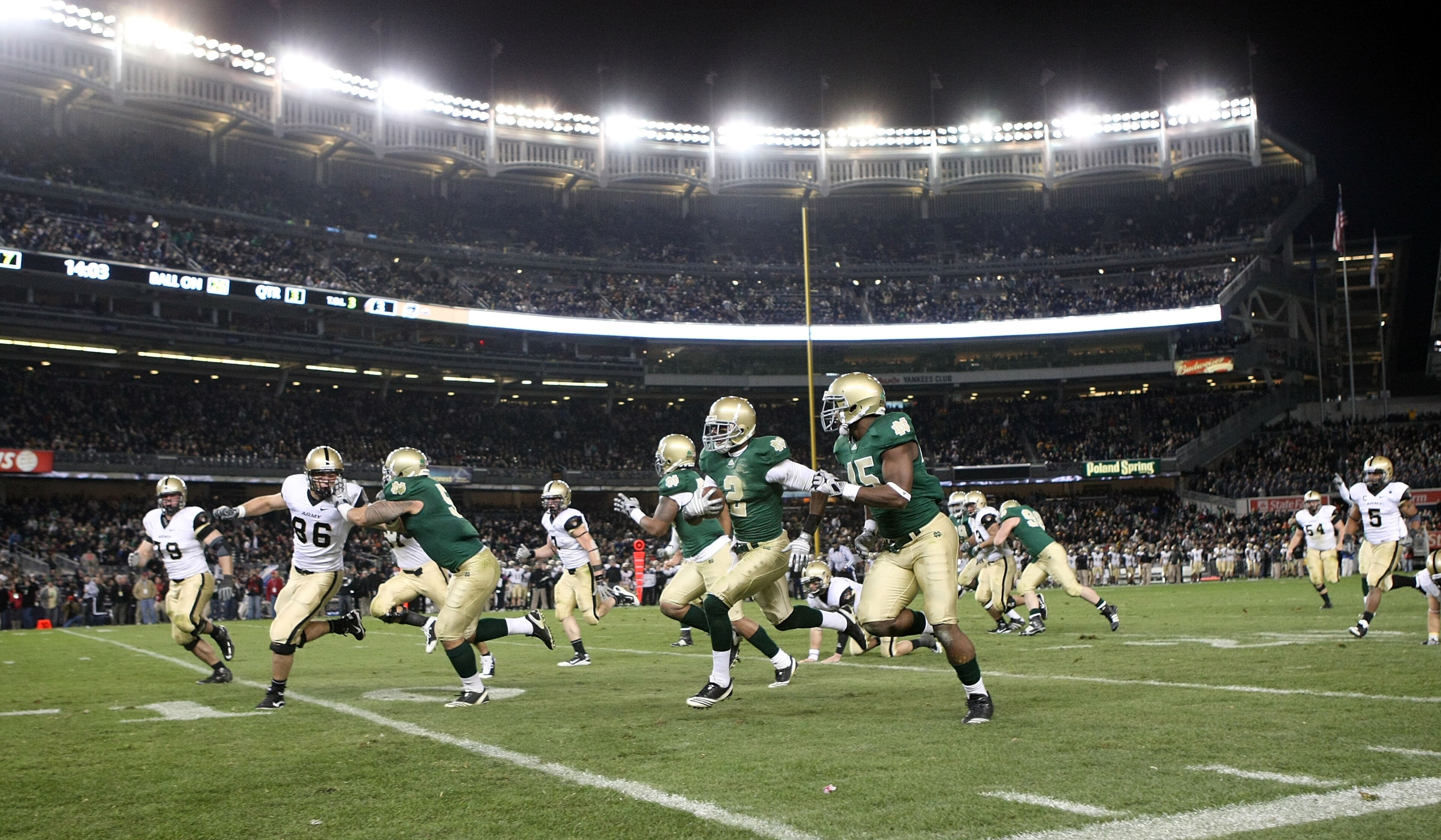 NEW YORK - NOVEMBER 20: Darrin Walls #2 of the Notre Dame Fighting Irish runs the ball in for a touchdown after an interception in the thrid quarter against the Army Black Knights at Yankee Stadium on November 20, 2010 in the Bronx borough of New York Cit