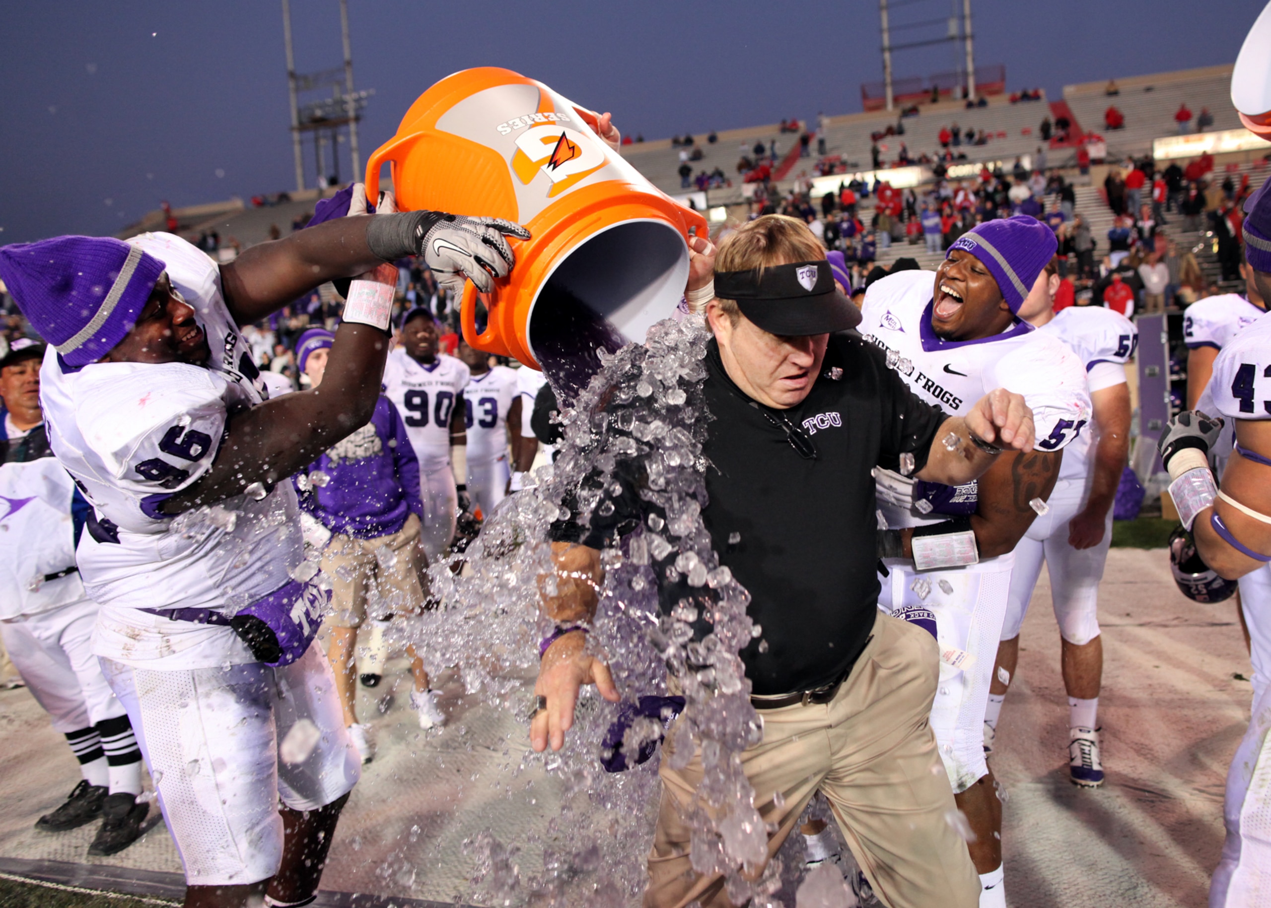 ALBUQUERQUE, NM - NOVEMBER 27: Head coach Gary Patterson of the TCU Horned Frogs is doused with Gatorade by his players while celebrating their win over the New Mexico Lobos on November 27, 2010 at University Stadium in Albuquerque, New Mexico. TCU won 66