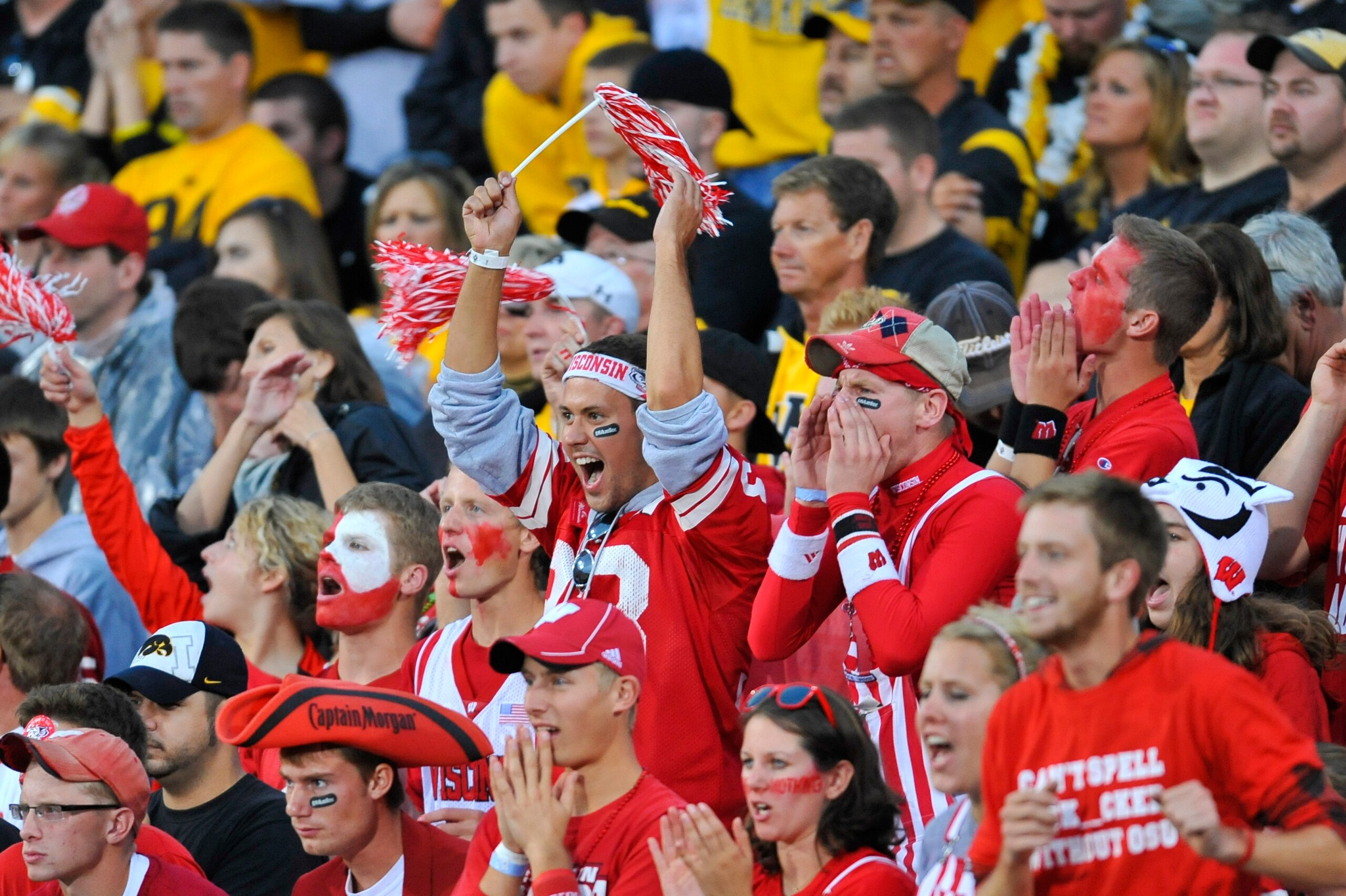 IOWA CITY, IA - OCTOBER 23: Wisconsin fans celebrate their team win over the University of Iowa Hawkeyes at Kinnick Stadium on October 23, 2010 in Iowa City, Iowa. Wisconsin won 31-30 over Iowa. (Photo by David Purdy/Getty Images).