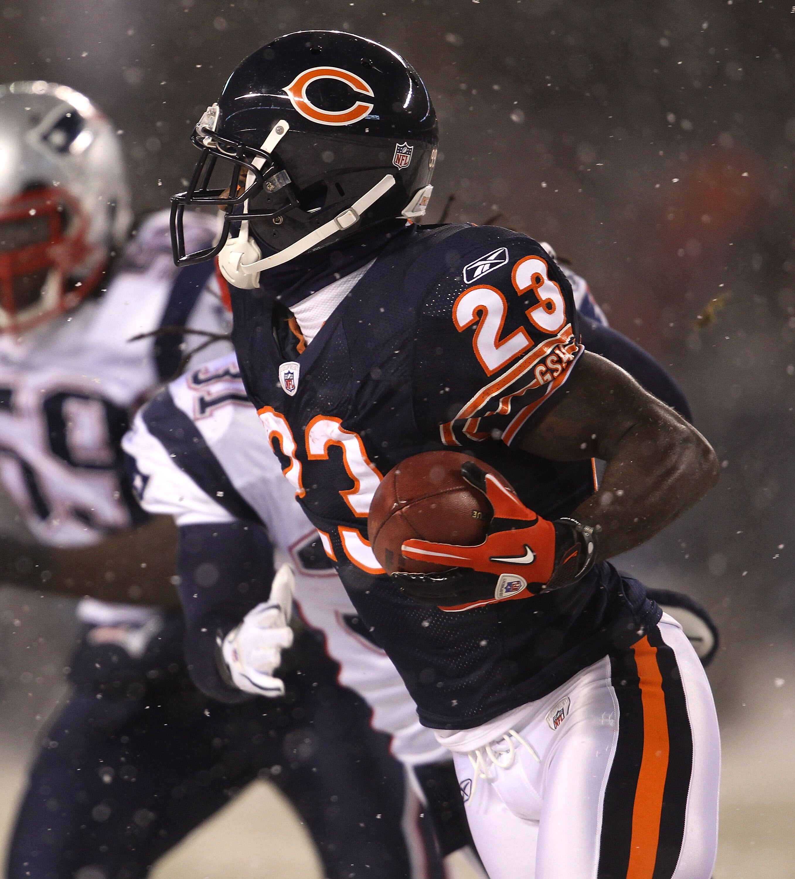 CHICAGO - DECEMBER 12: Devin Hester #23 of the Chicago Bears runs against the New England Patriots at Soldier Field on December 12, 2010 in Chicago, Illinois. The Patriots defeated the Bears 36-7. (Photo by Jonathan Daniel/Getty Images)