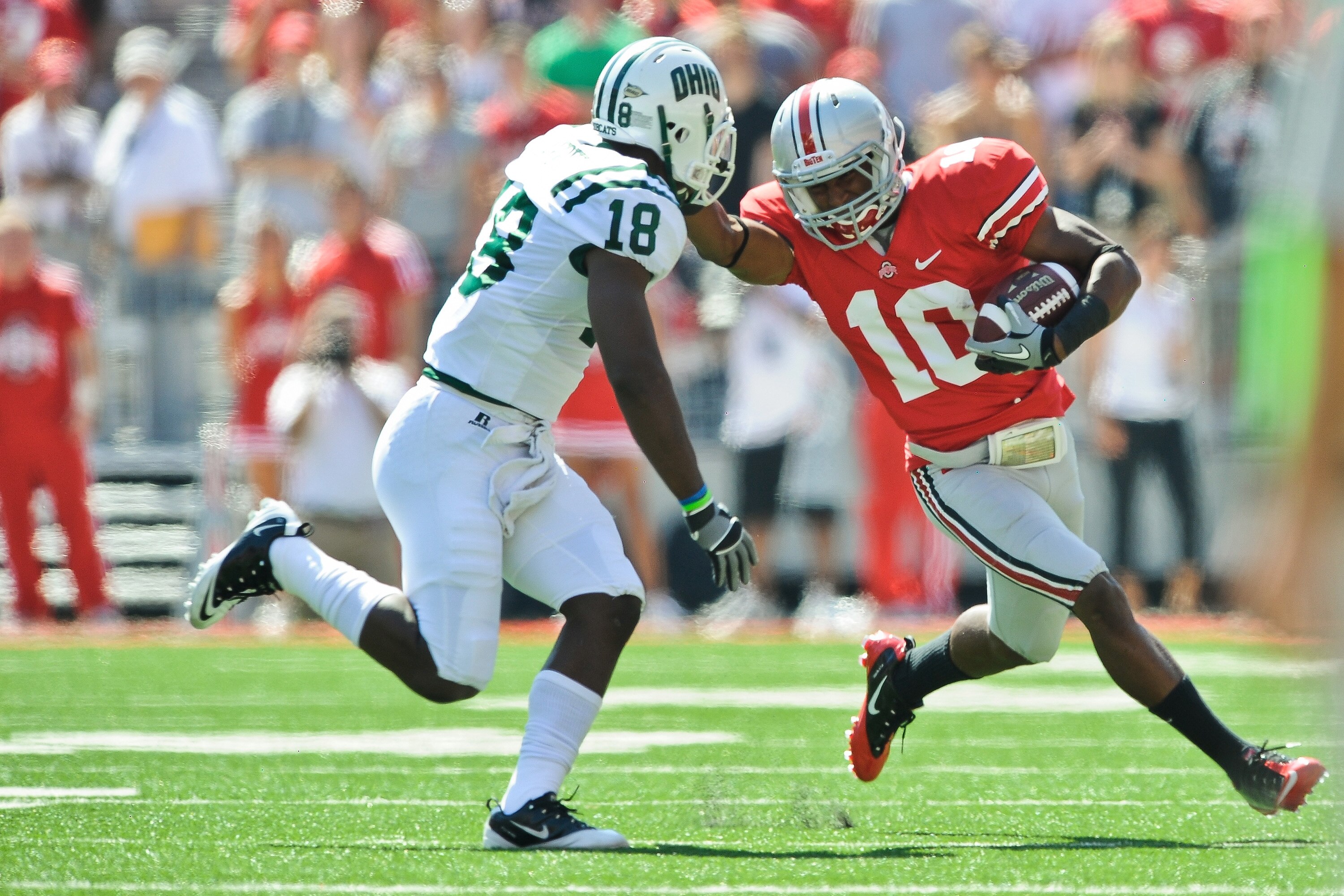 COLUMBUS, OH - SEPTEMBER 18:  Corey Brown #10 of the Ohio State Buckeyes runs with the ball as Travis Carrie #18 of the Ohio Bobcats defends at Ohio Stadium on September 18, 2010 in Columbus, Ohio.  (Photo by Jamie Sabau/Getty Images)