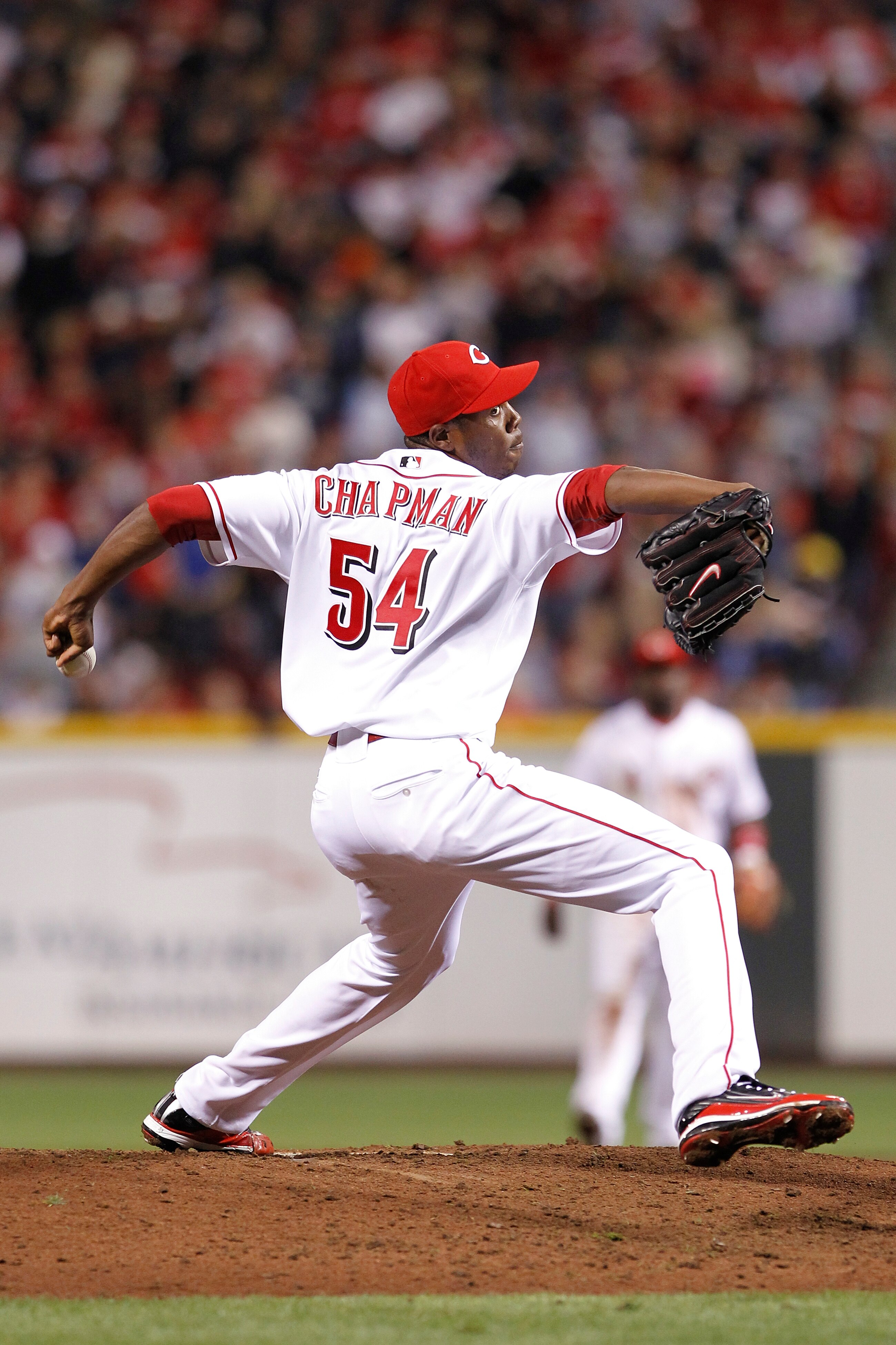 CINCINNATI, OH - SEPTEMBER 28: Aroldis Chapman #54 of the Cincinnati Reds pitches against the Houston Astros at Great American Ball Park on September 28, 2010 in Cincinnati, Ohio. The Reds won 3-2 to clinch the NL Central Division title. (Photo by Joe Rob