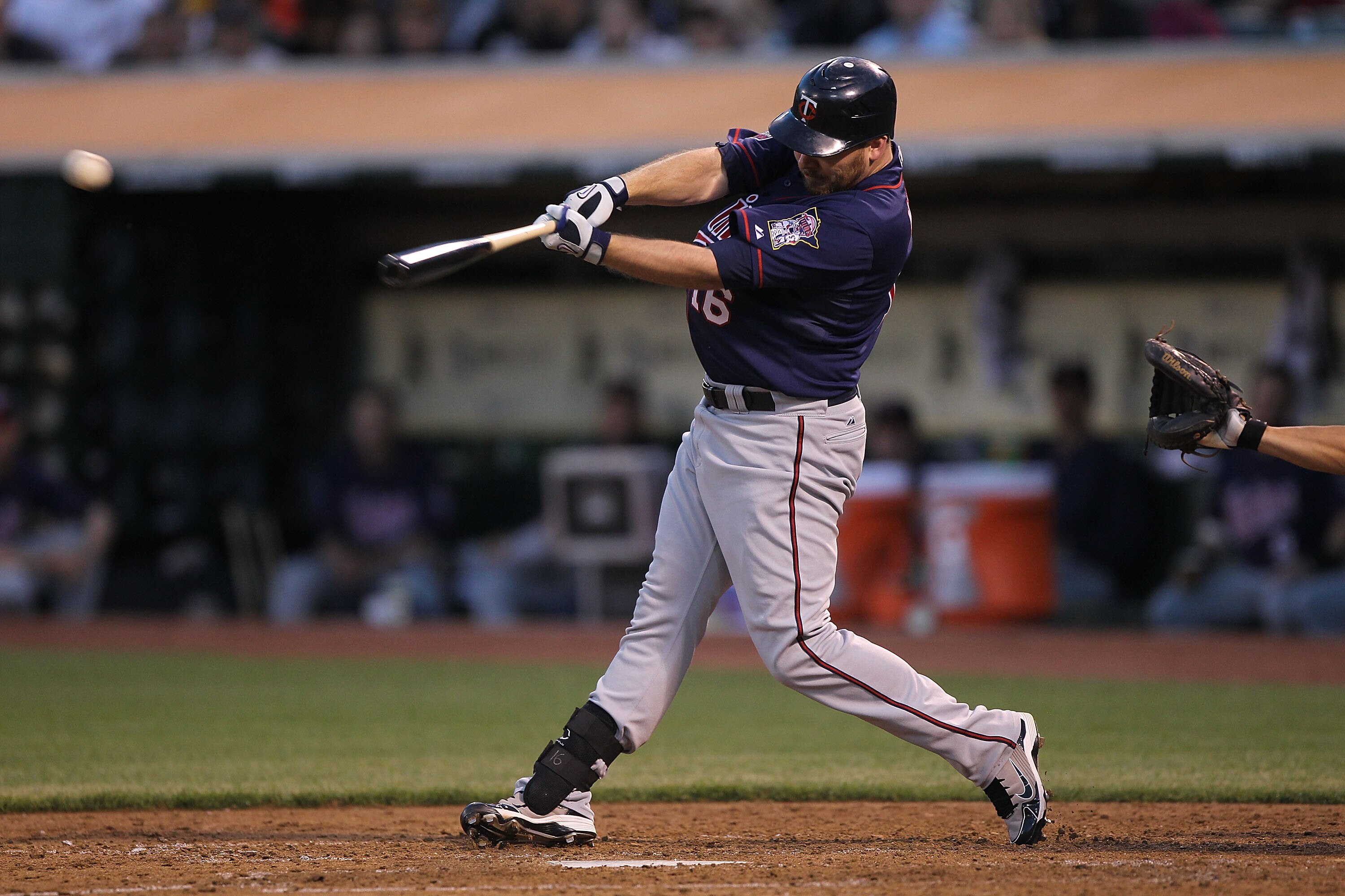 OAKLAND, CA - JUNE 4:  Jason Kubel #16 of the Minnesota Twins hits an RBI single in the sixth inning against the Oakland Athletics during an MLB game at the Oakland-Alameda County Coliseum on June 4, 2010 in Oakland, California. (Photo by Jed Jacobsohn/Ge