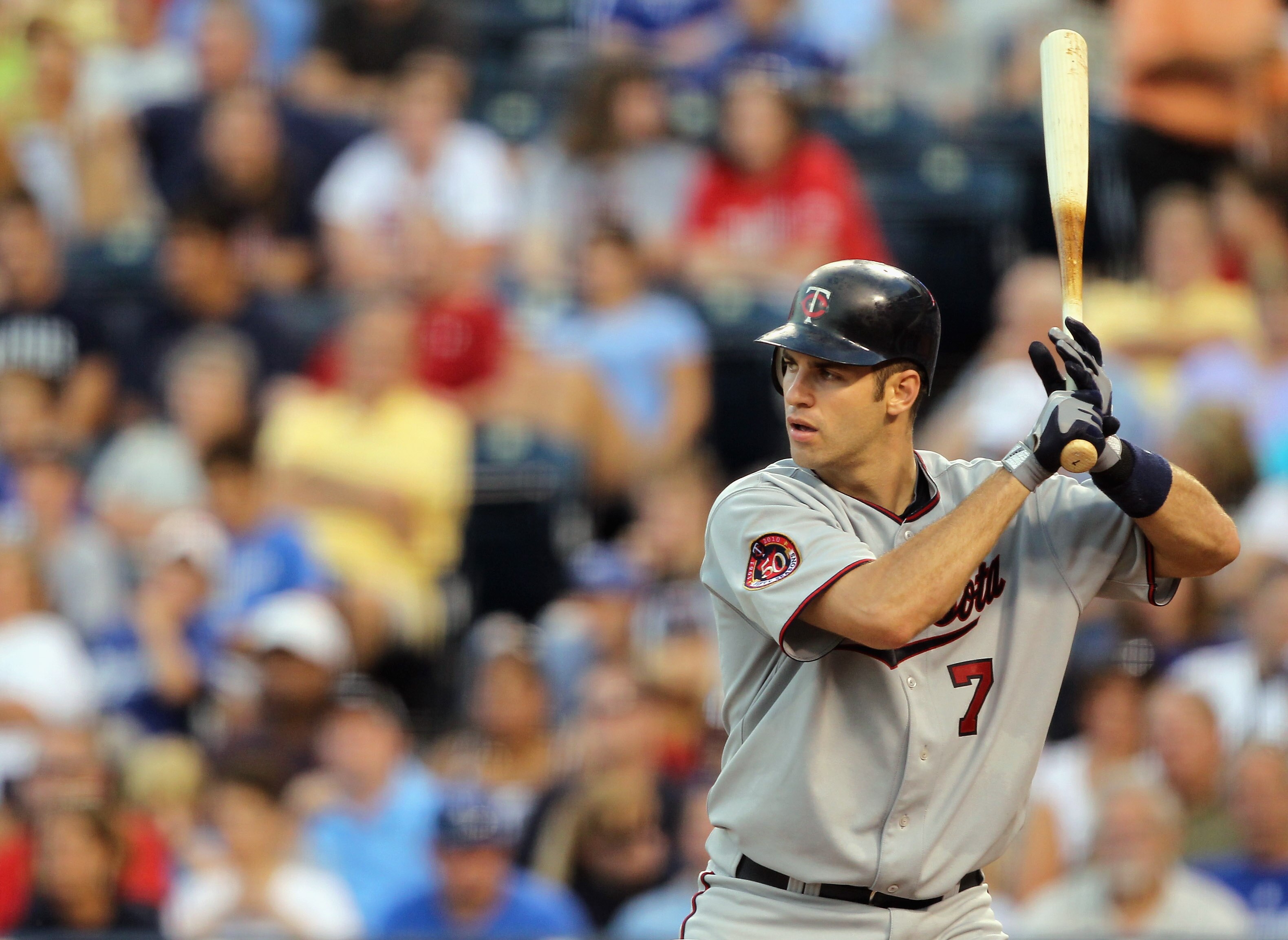 KANSAS CITY, MO - JULY 26:  Catcher Joe Mauer #7 of the Minnesota Twins bats during the game against the Kansas City Royals on July 26, 2010 at Kauffman Stadium in Kansas City, Missouri.  (Photo by Jamie Squire/Getty Images)