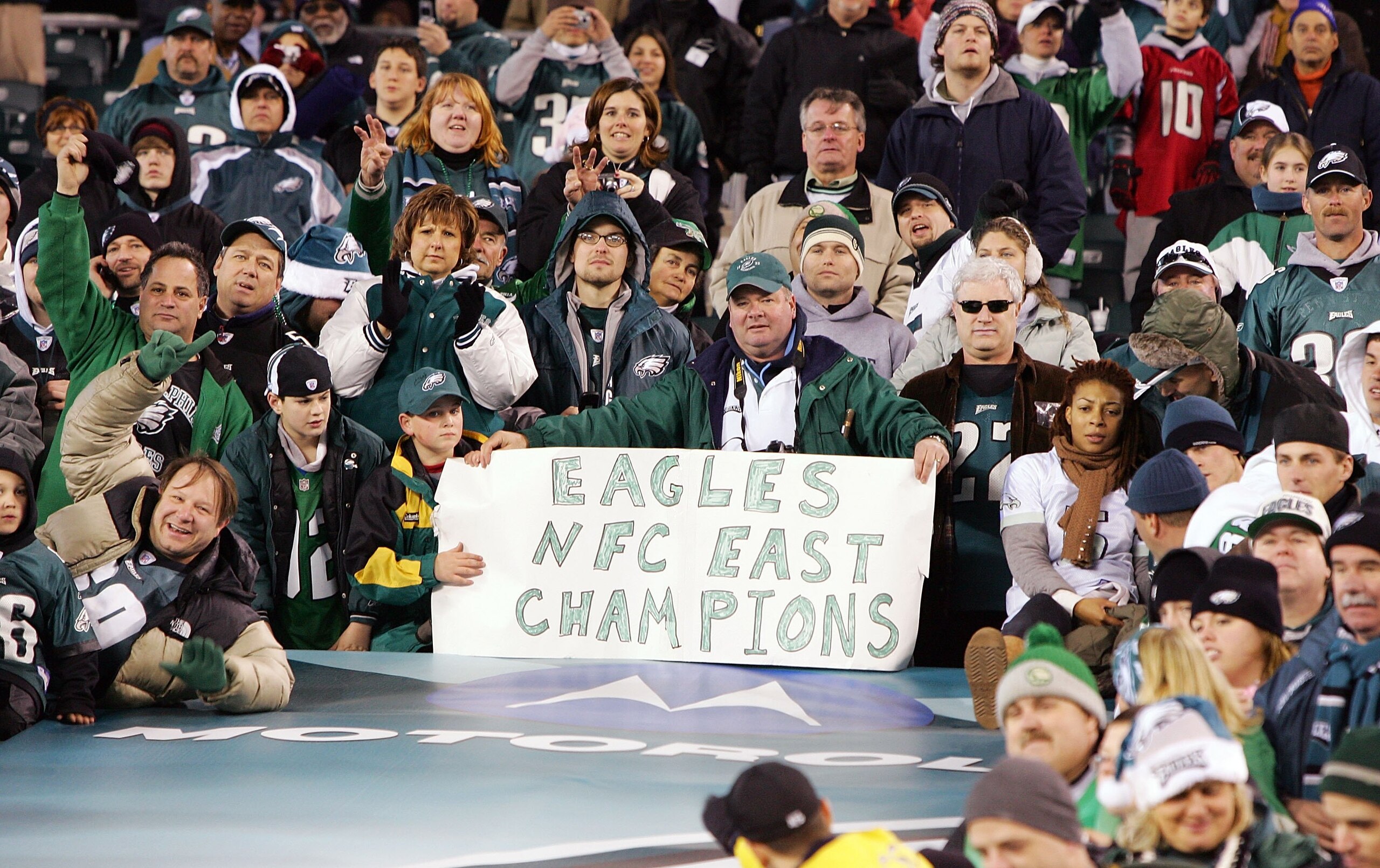 PHILADELPHIA - DECEMBER 31: Philadelphia Eagles fans celebrate after a win over the Atlanta Falcons in NFL action December 31, 2006 at Lincoln Financial Field in Philadelphia, Pennsylvania. The Eagles won 24-17.  (Photo by Jim McIsaac/Getty Images)