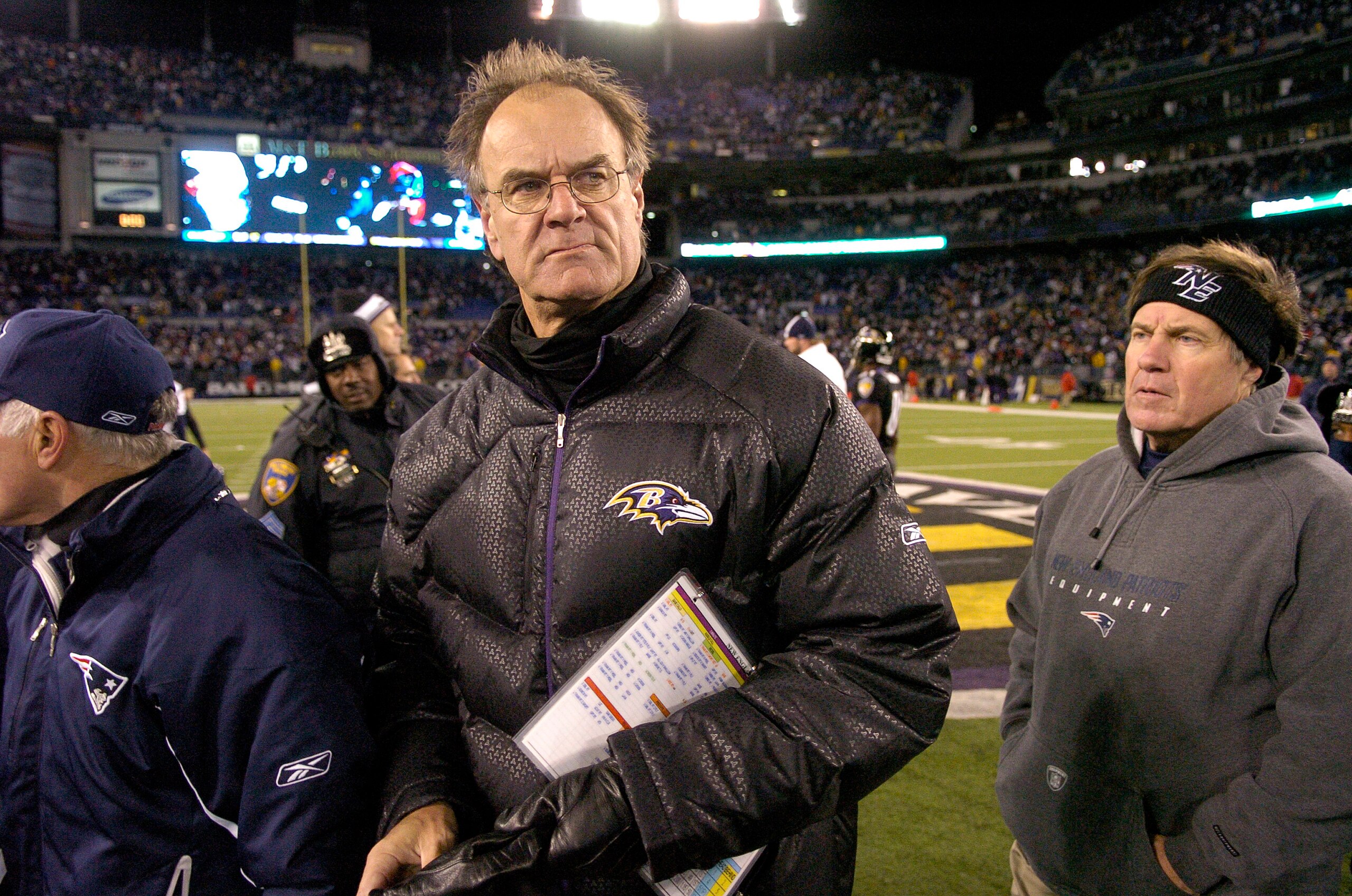 BALTIMORE - DECEMBER 3:  Head Coach Brian Billick (C) of the Baltimore Ravens and Head Coach Bill Belichick (R) of the New England Patriots walk off the field at the end of the game at M&T Bank Stadium December 3, 2007 in Baltimore, Maryland.  The Patriot