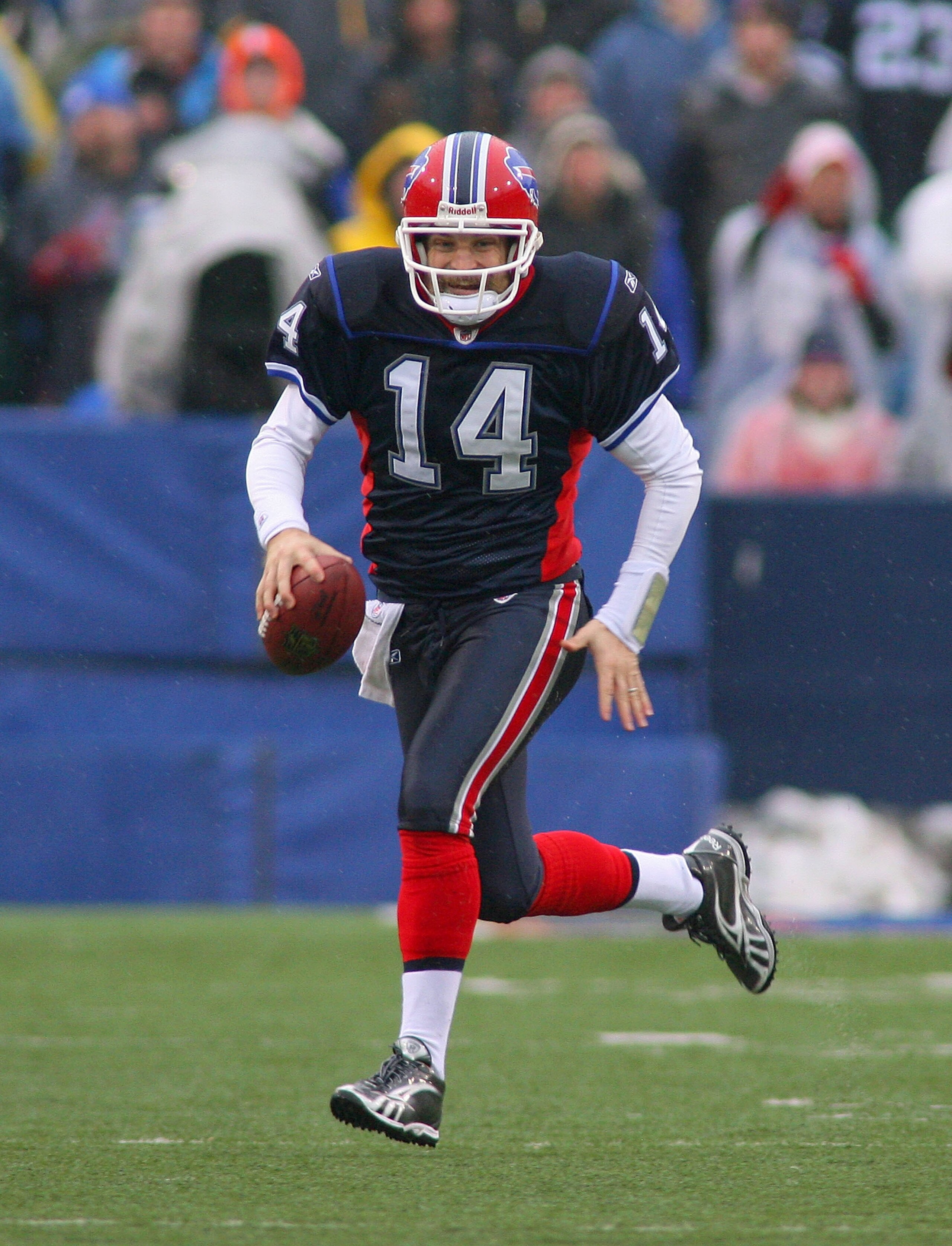 ORCHARD PARK, NY - DECEMBER 12: Ryan Fitzpatrick #14 of the Buffalo Bills runs against the Cleveland Browns at Ralph Wilson Stadium on December 12, 2010 in Orchard Park, New York.  (Photo by Rick Stewart/Getty Images)