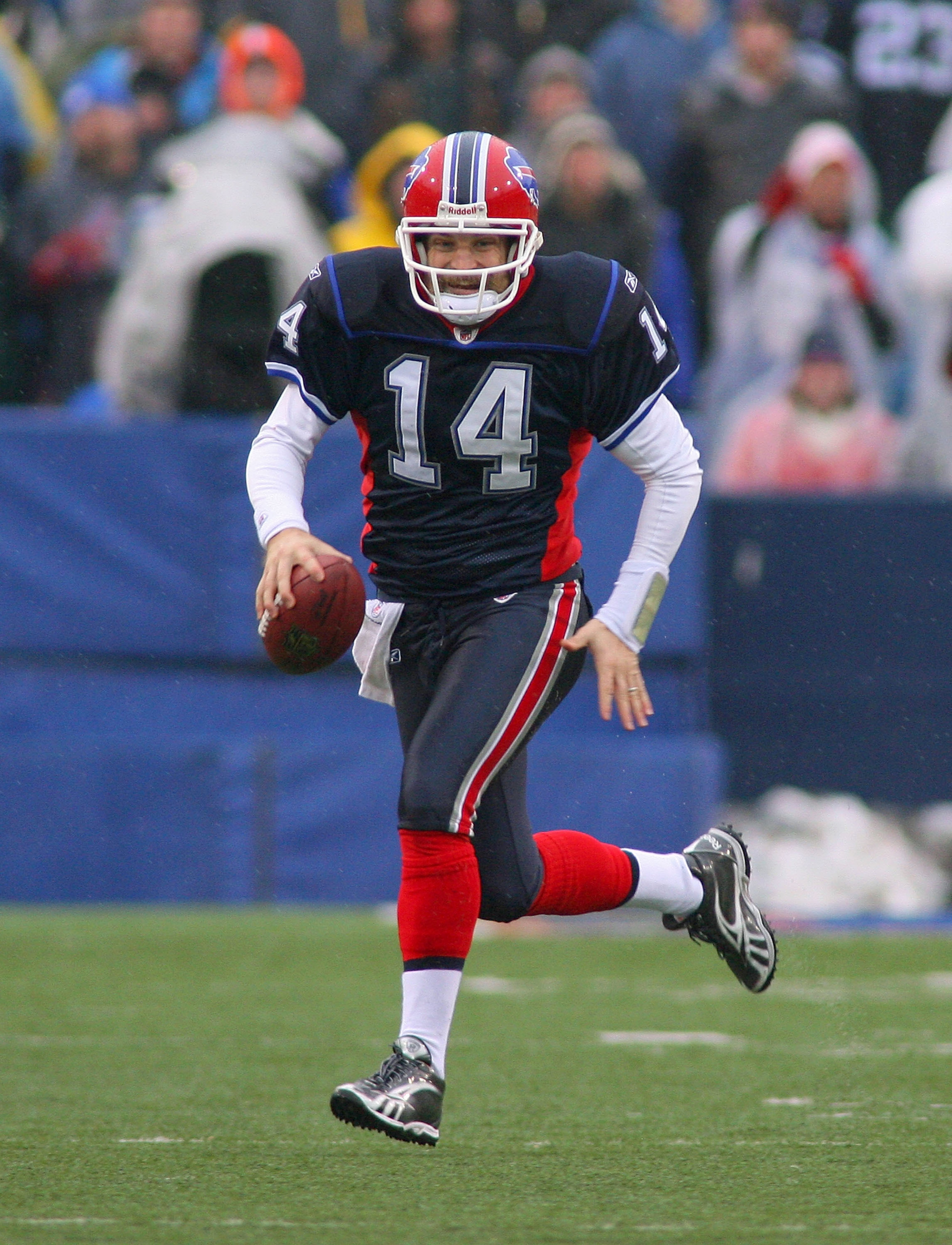 ORCHARD PARK, NY - DECEMBER 12: Ryan Fitzpatrick #14 of the Buffalo Bills runs against the Cleveland Browns at Ralph Wilson Stadium on December 12, 2010 in Orchard Park, New York.  (Photo by Rick Stewart/Getty Images)