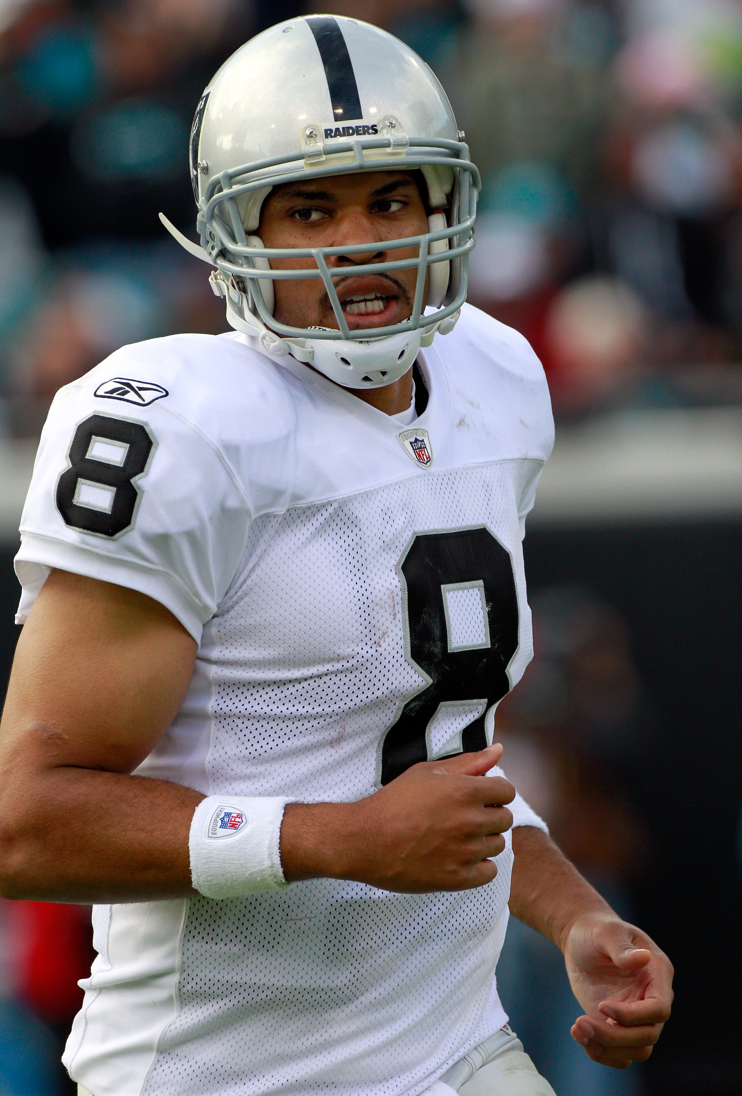 JACKSONVILLE, FL - DECEMBER 12:  Jason Campbell #8 of the Oakland Raiders runs during the game against the Jacksonville Jaguars at EverBank Field on December 12, 2010 in Jacksonville, Florida.  (Photo by Sam Greenwood/Getty Images)