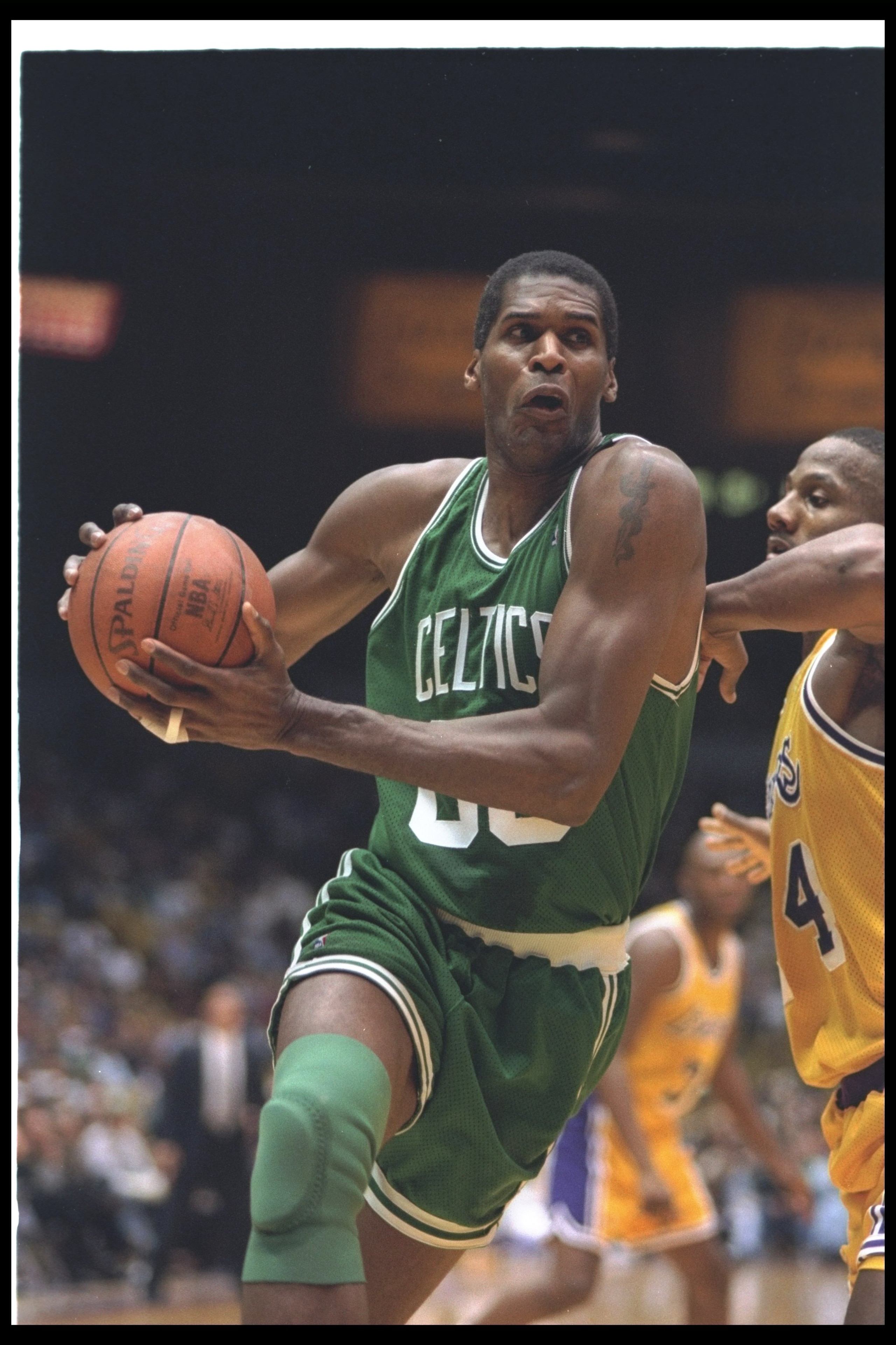 27 Feb 1994:  Center Robert Parish of the Boston Celtics moves the ball during a game against the Los Angeles Lakers at the Great Western Forum in Inglewood, California. Mandatory Credit: Glenn Cratty  /Allsport