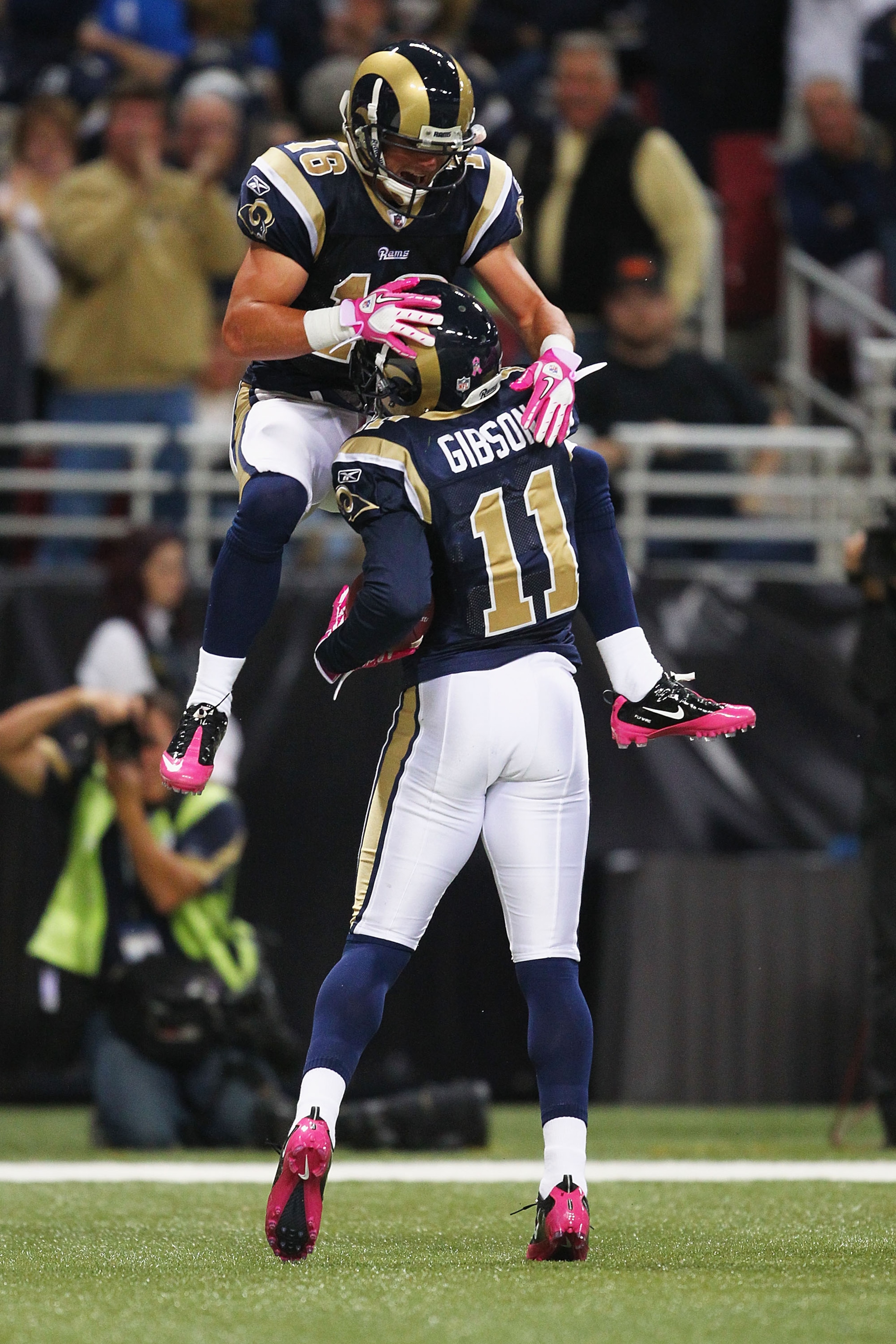 ST. LOUIS - OCTOBER 3: Brandon Gibson #11 of the St. Louis Rams is congratulated by teammate Danny Amendola #16 after scoring a touchdown against the Seattle Seahawks at the Edward Jones Dome on October 3, 2010 in St. Louis, Missouri.  The Rams beat the S