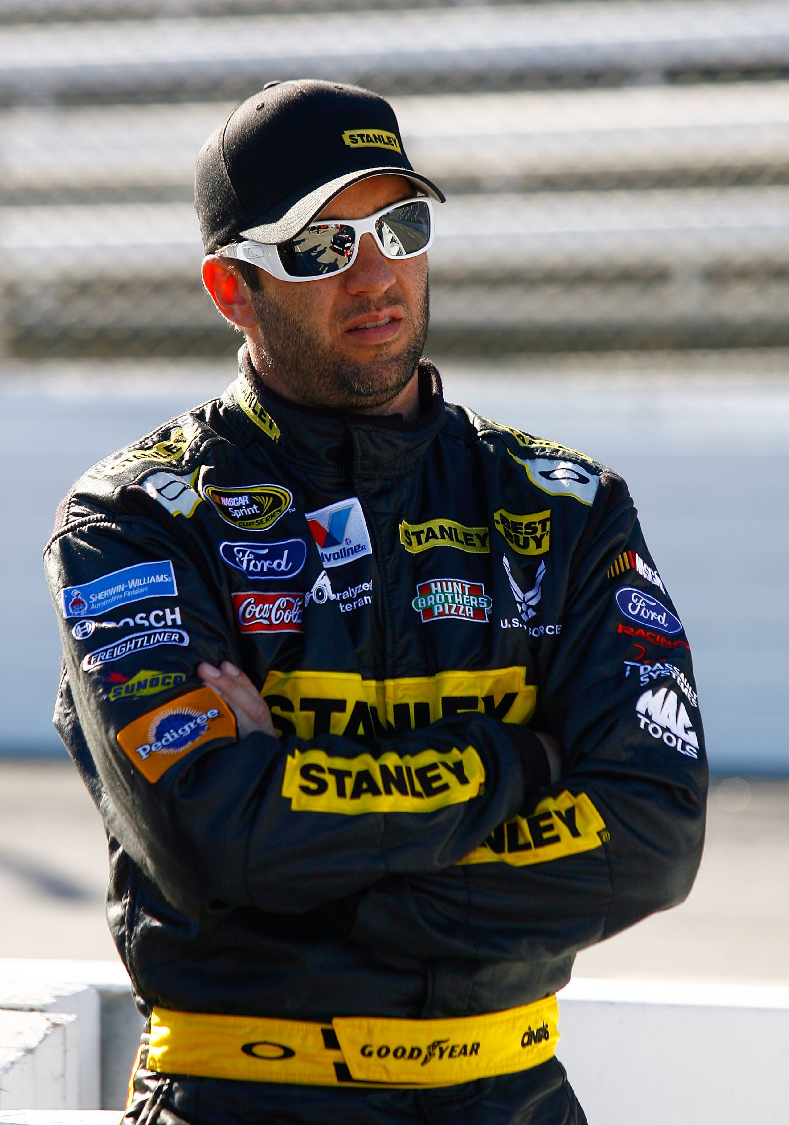 MARTINSVILLE, VA - OCTOBER 22: Elliott Sadler, driver of the #19 Stanley Ford, stands on pit road during qualifying for the NASCAR Sprint Cup Series TUMS Fast Relief 500 at Martinsville Speedway on October 22, 2010 in Martinsville, Virginia. (Photo by J MARTINSVILLE, VA - OCTOBER 22: Elliott Sadler, driver of the #19 Stanley Ford, stands on pit road during qualifying for the NASCAR Sprint Cup Series TUMS Fast Relief 500 at Martinsville Speedway on October 22, 2010 in Martinsville, Virginia. (Photo by J