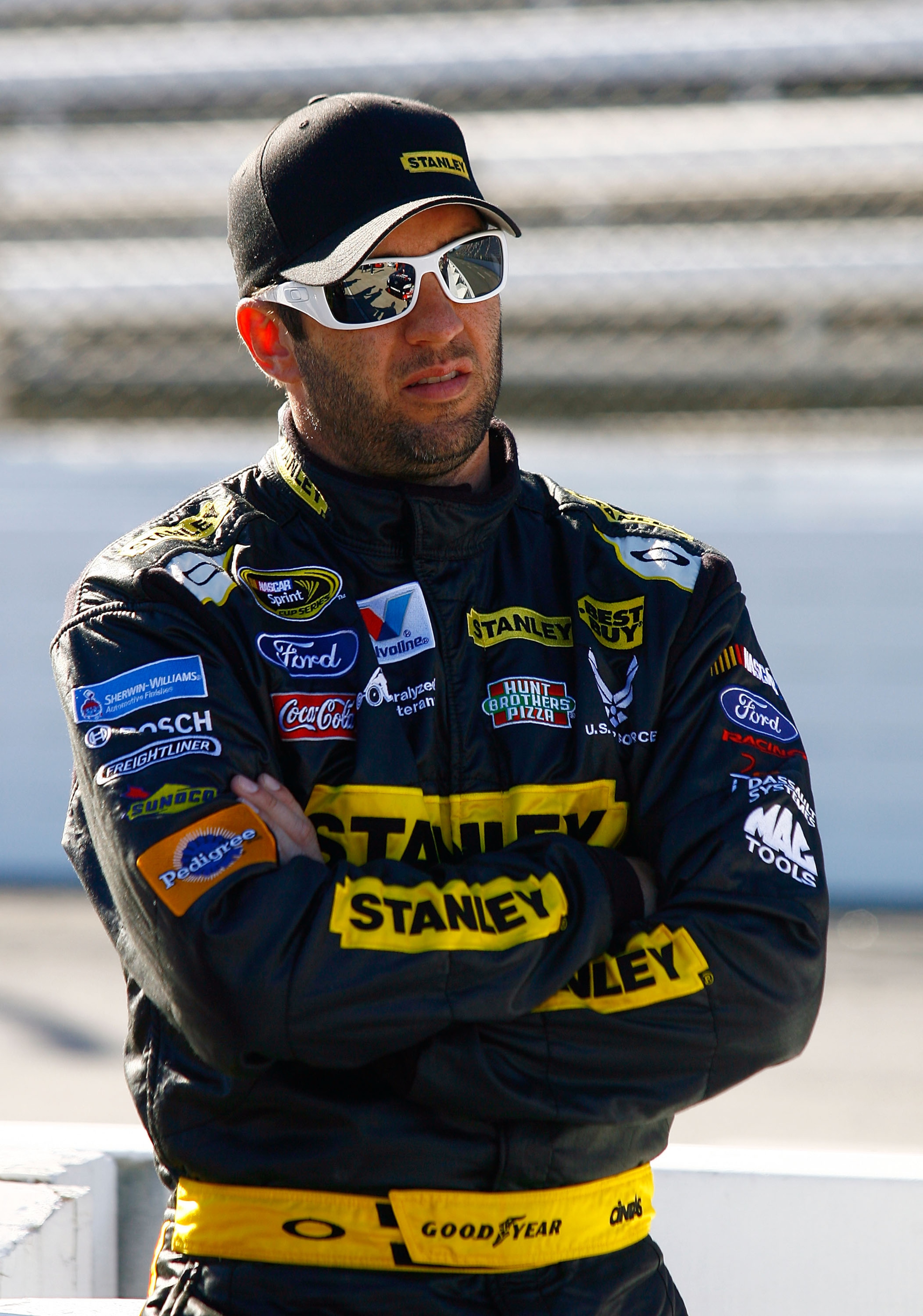 MARTINSVILLE, VA - OCTOBER 22:  Elliott Sadler, driver of the #19 Stanley Ford, stands on pit road during qualifying for the NASCAR Sprint Cup Series TUMS Fast Relief 500 at Martinsville Speedway on October 22, 2010 in Martinsville, Virginia.  (Photo by J