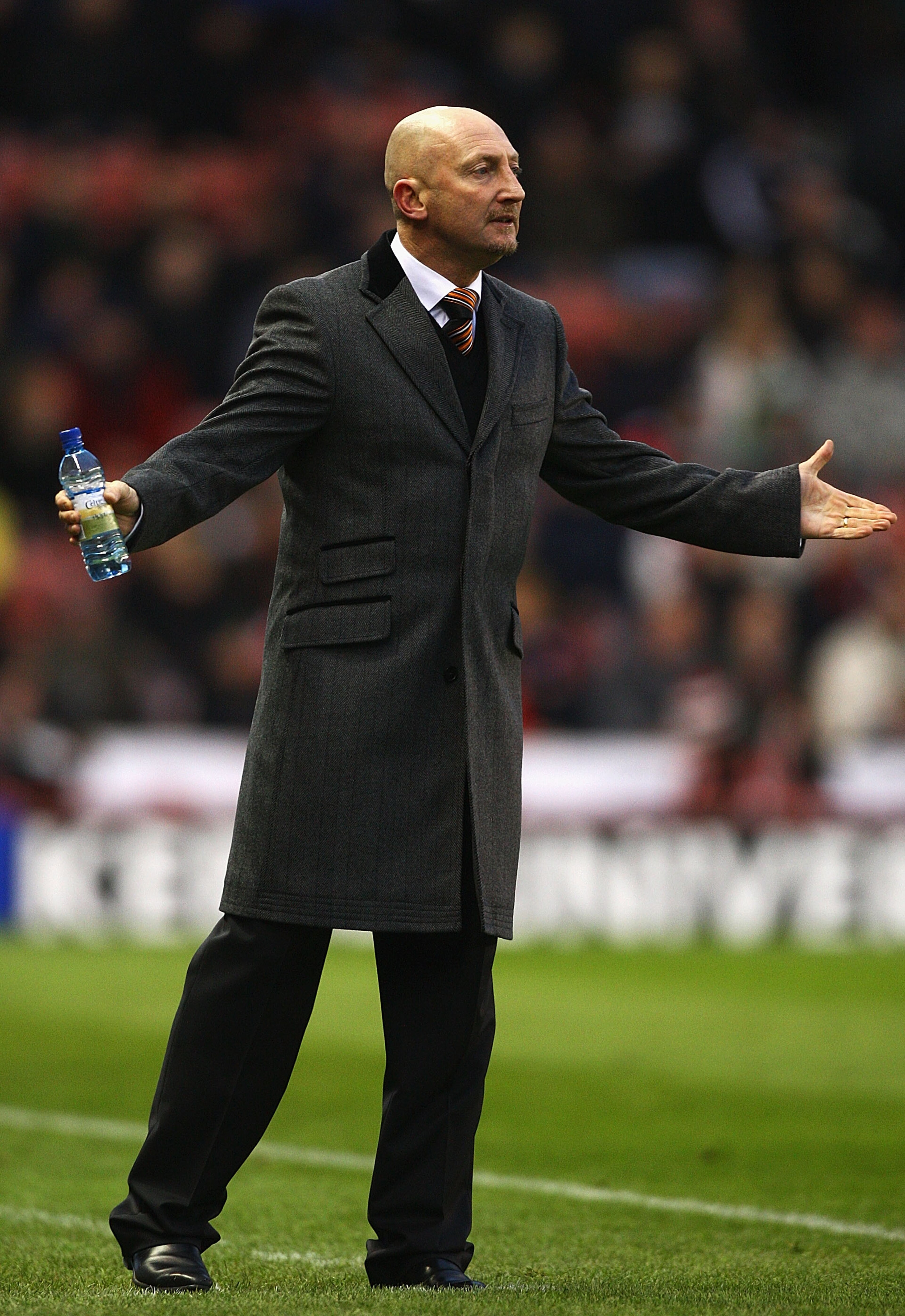STOKE ON TRENT, ENGLAND - DECEMBER 11:  Ian Holloway, manager of Blackpool looks on during the Barclays Premier League match between Stoke City and Blackpool at Britannia Stadium on December 11, 2010 in Stoke on Trent, England.  (Photo by Matthew Lewis/Ge