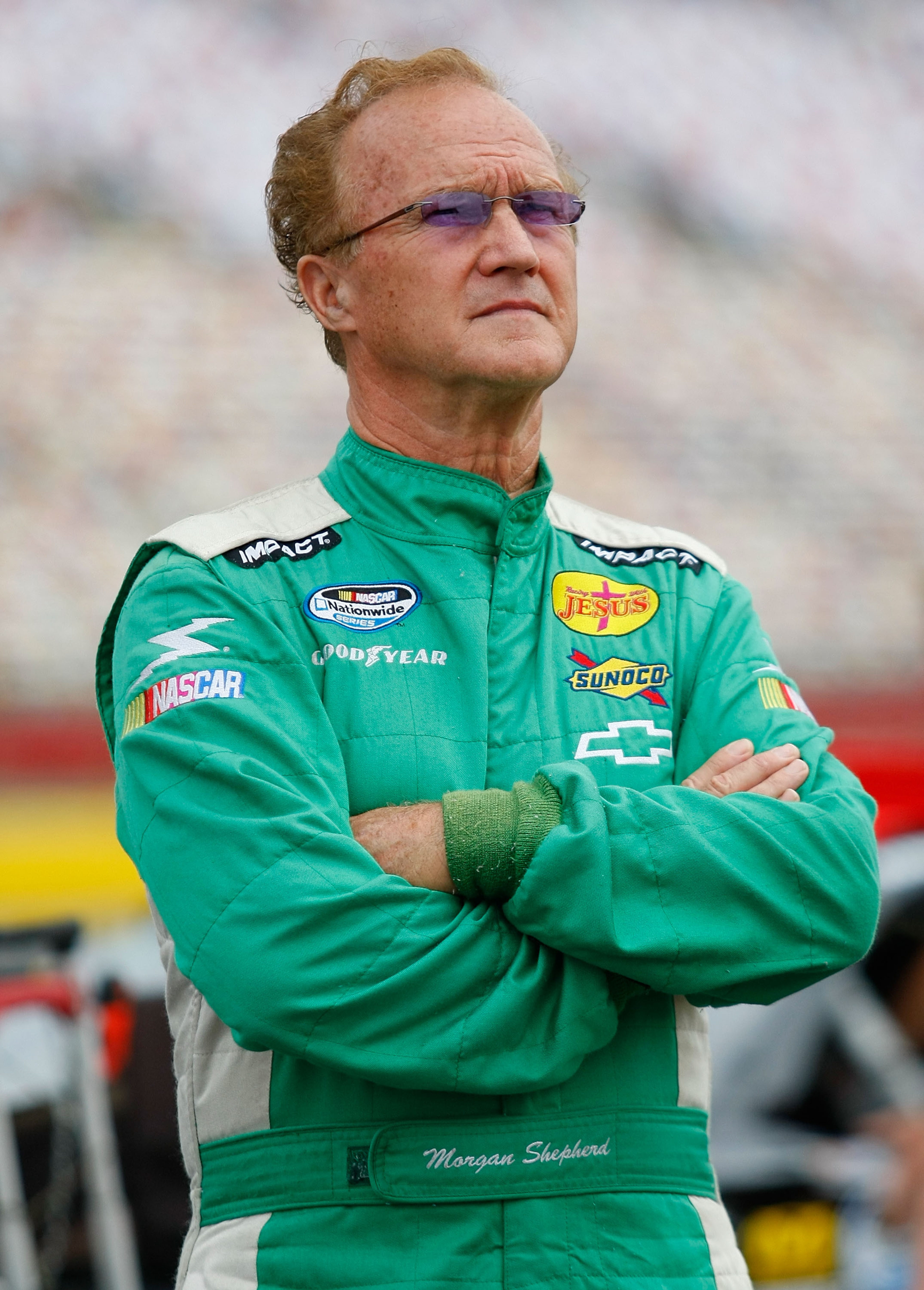 CONCORD, NC - MAY 29:  Morgan Shepherd, driver of the #89 Victory in Jesus Chevrolet, stands on the grid during qualifying for the NASCAR Nationwide Series Tech-Net Auto Service 300 at Charlotte Motor Speedway on May 29, 2010 in Concord, North Carolina.