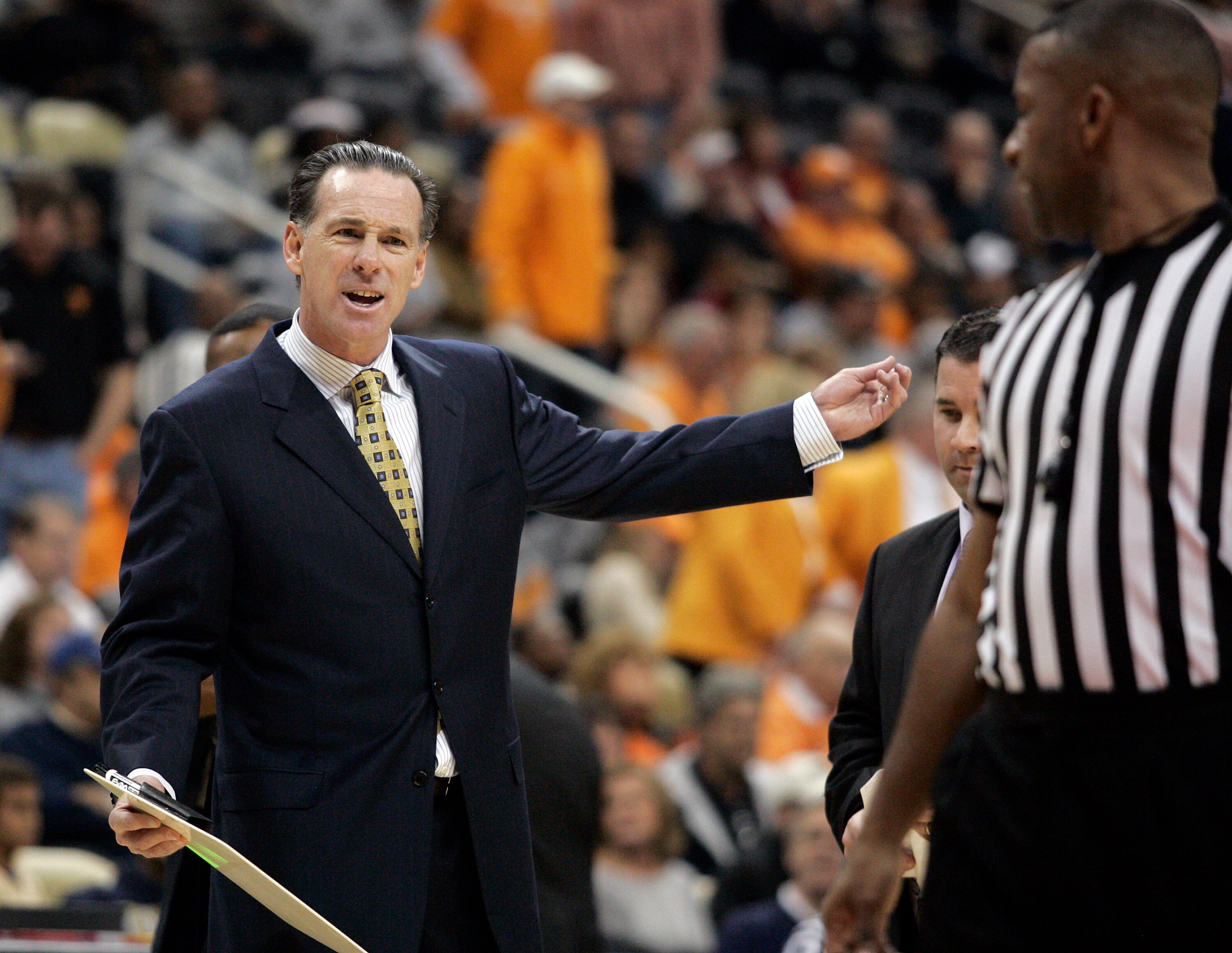 PITTSBURGH, PA - DECEMBER 11:  Pittsburgh Panthers head coach Jamie Dixon questions a call against the Tennessee Volunteers during the SEC/BIG EAST Invitational at Consol Energy Center on December 11, 2010 in Pittsburgh, Pennsylvania.  (Photo by Justin K.