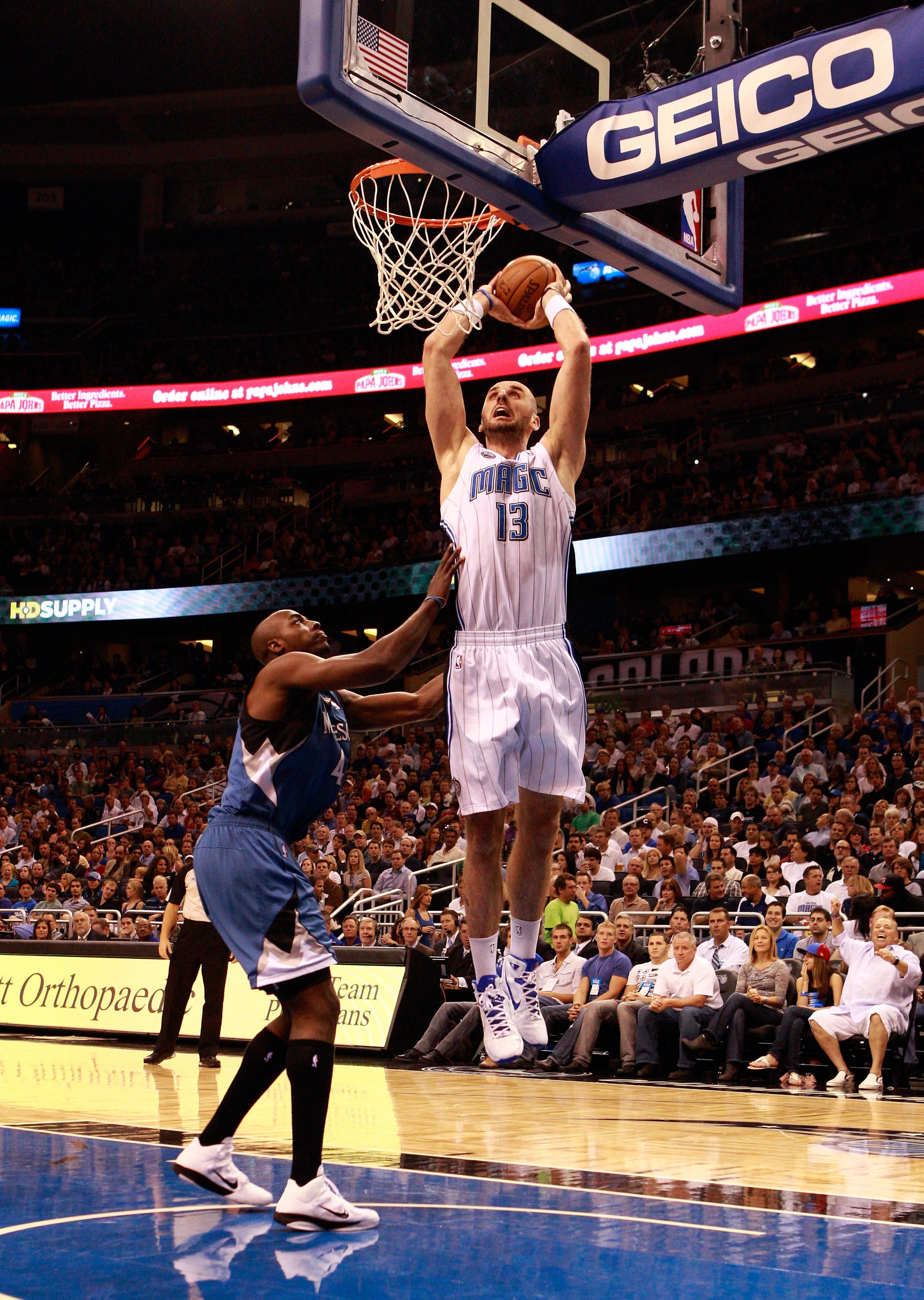ORLANDO, FL - NOVEMBER 03:  Marcin Gortat #13 of the Orlando Magic attempts a shot over Wesley Johnson #4 of the Minnesota Timberwolves during the game at Amway Arena on November 3, 2010 in Orlando, Florida.  NOTE TO USER: User expressly acknowledges and