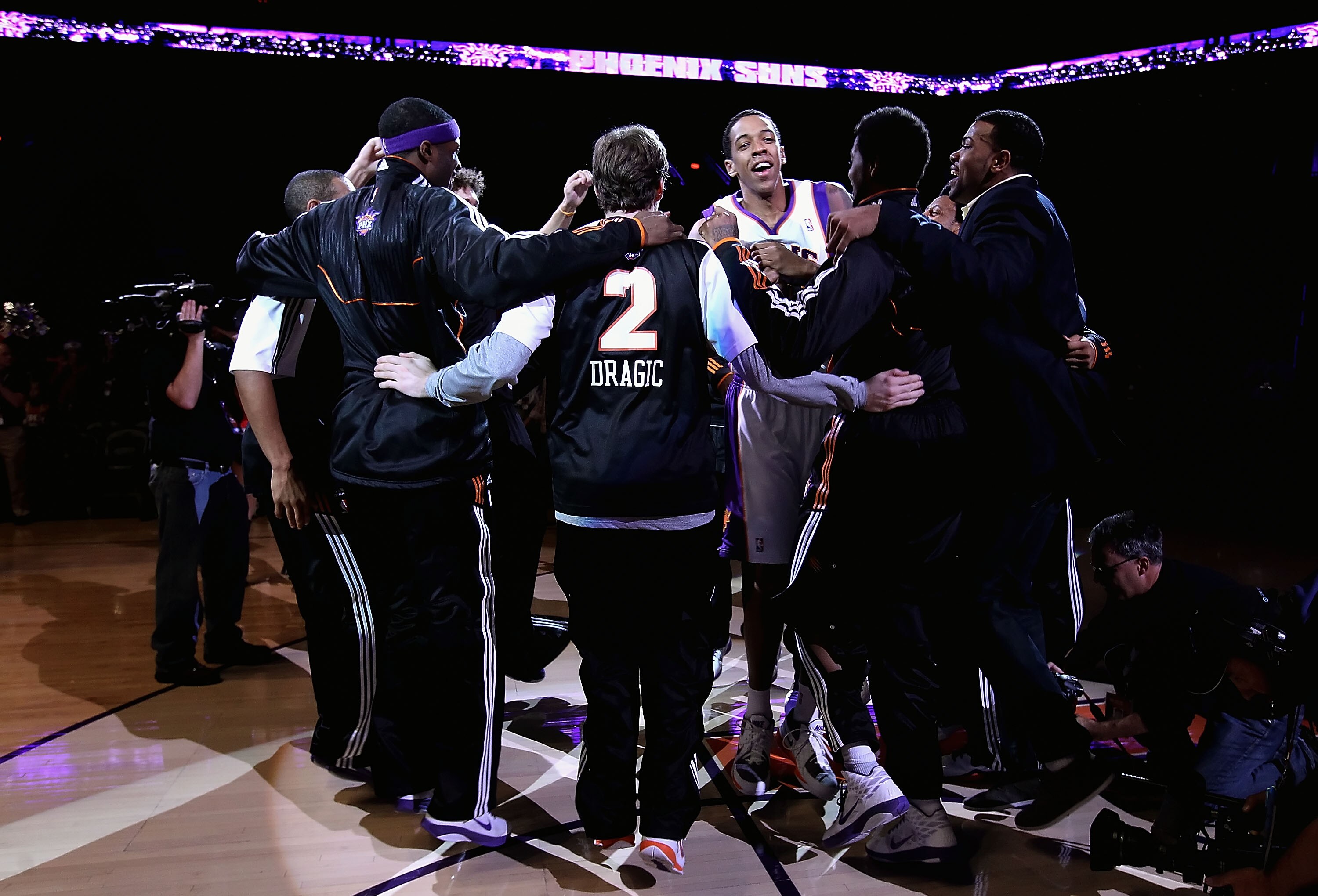 PHOENIX - DECEMBER 15:   The Phoenix Suns huddle up around Channing Frye #8 before the NBA game against the Minnesota Timberwolves at US Airways Center on December 15, 2010 in Phoenix, Arizona. The Suns defeated the Timberwolves 128-122. NOTE TO USER: Use