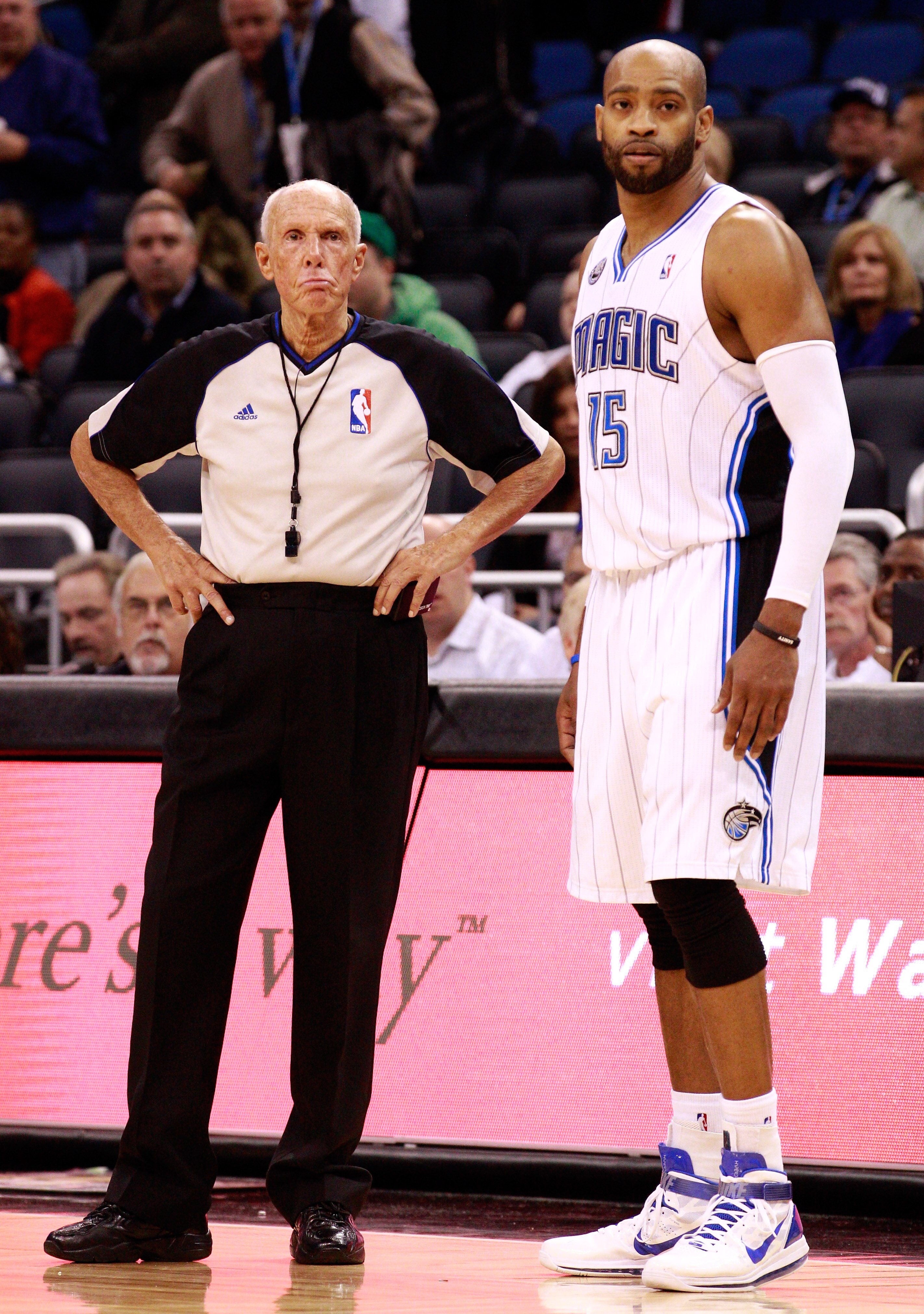 ORLANDO, FL - DECEMBER 06:  Vince Carter #15 of the Orlando Magic stands with referee Dick Bavetta #27 during the game against the Atlanta Hawks at Amway Arena on December 6, 2010 in Orlando, Florida. NOTE TO USER: User expressly acknowledges and agrees t