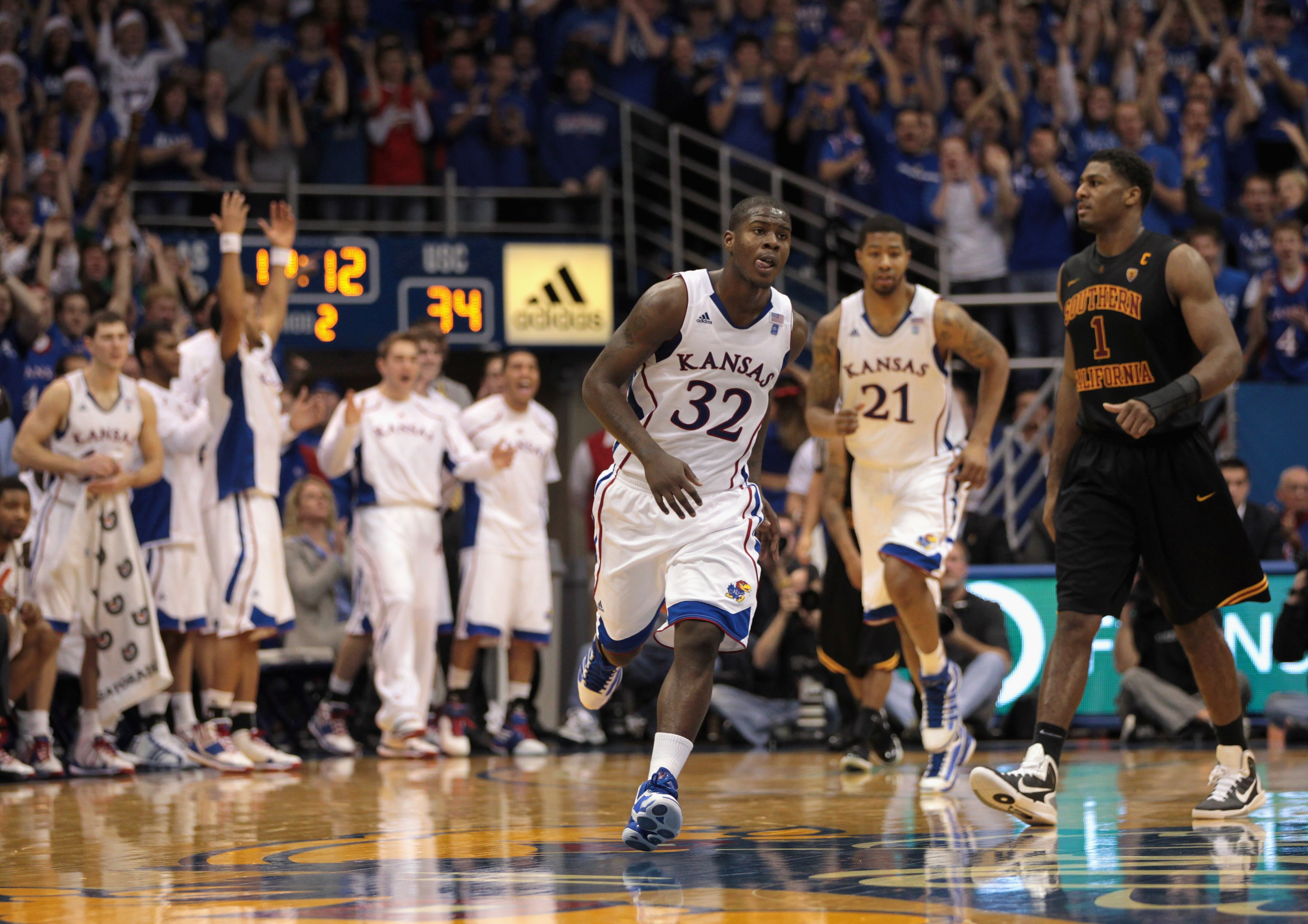 LAWRENCE, KS - DECEMBER 18:  Josh Selby #32 of the Kansas Jayhawks reacts after scoring during the game against the USC Trojans on December 18, 2010 at Allen Fieldhouse in Lawrence, Kansas.  (Photo by Jamie Squire/Getty Images)