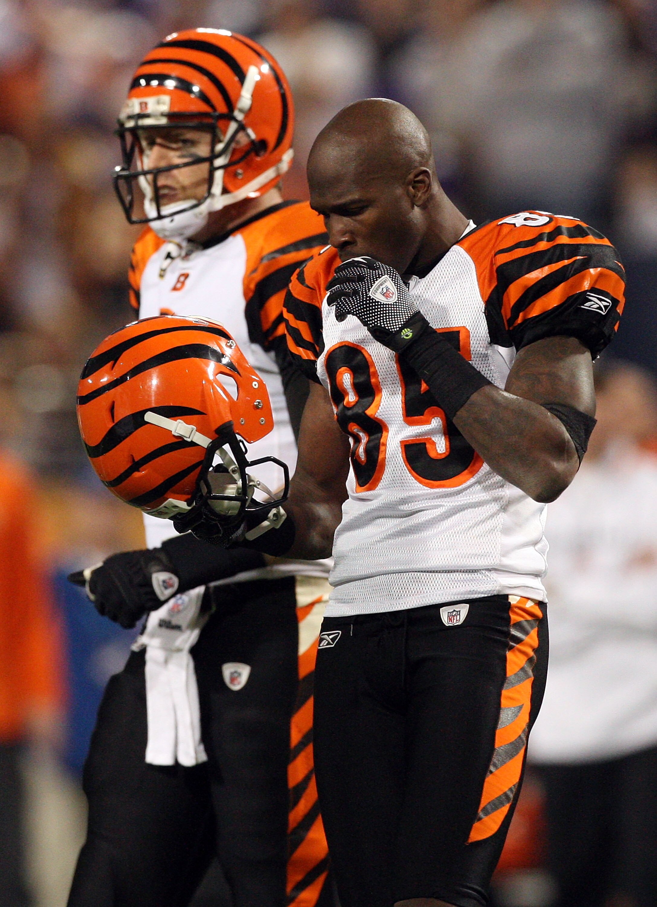 MINNEAPOLIS, MN - DECEMBER 13:  Chad Ochocinco #85 and Carson Palmer #9 of the Cincinnati Bengals look on in the second half against the Minnesota Vikings on December 13, 2009 at Hubert H. Humphrey Metrodome in Minneapolis, Minnesota. The Vikings defeated