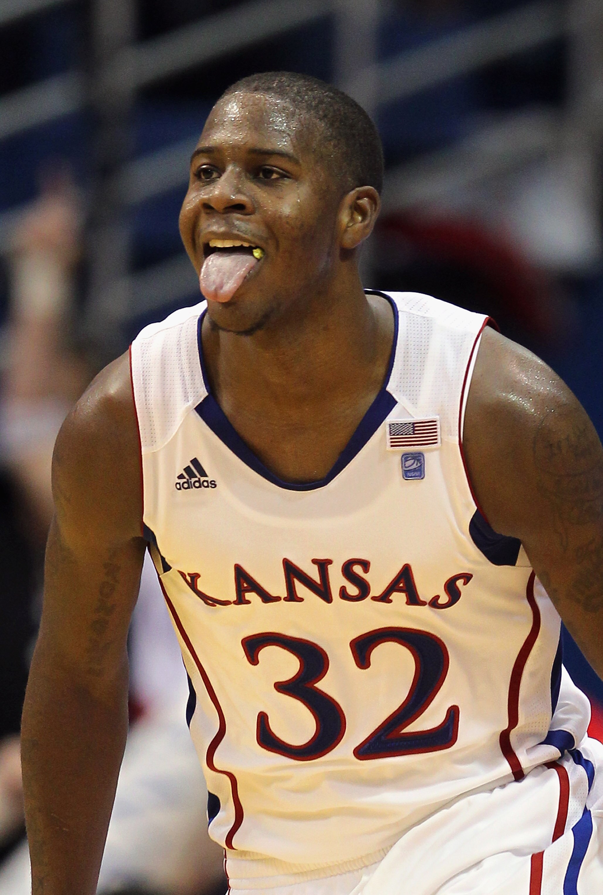 LAWRENCE, KS - DECEMBER 18:  Josh Selby #32 of the Kansas Jayhawks reacts after sinking a three-pointer during the game against the USC Trojans on December 18, 2010 at Allen Fieldhouse in Lawrence, Kansas.  (Photo by Jamie Squire/Getty Images)
