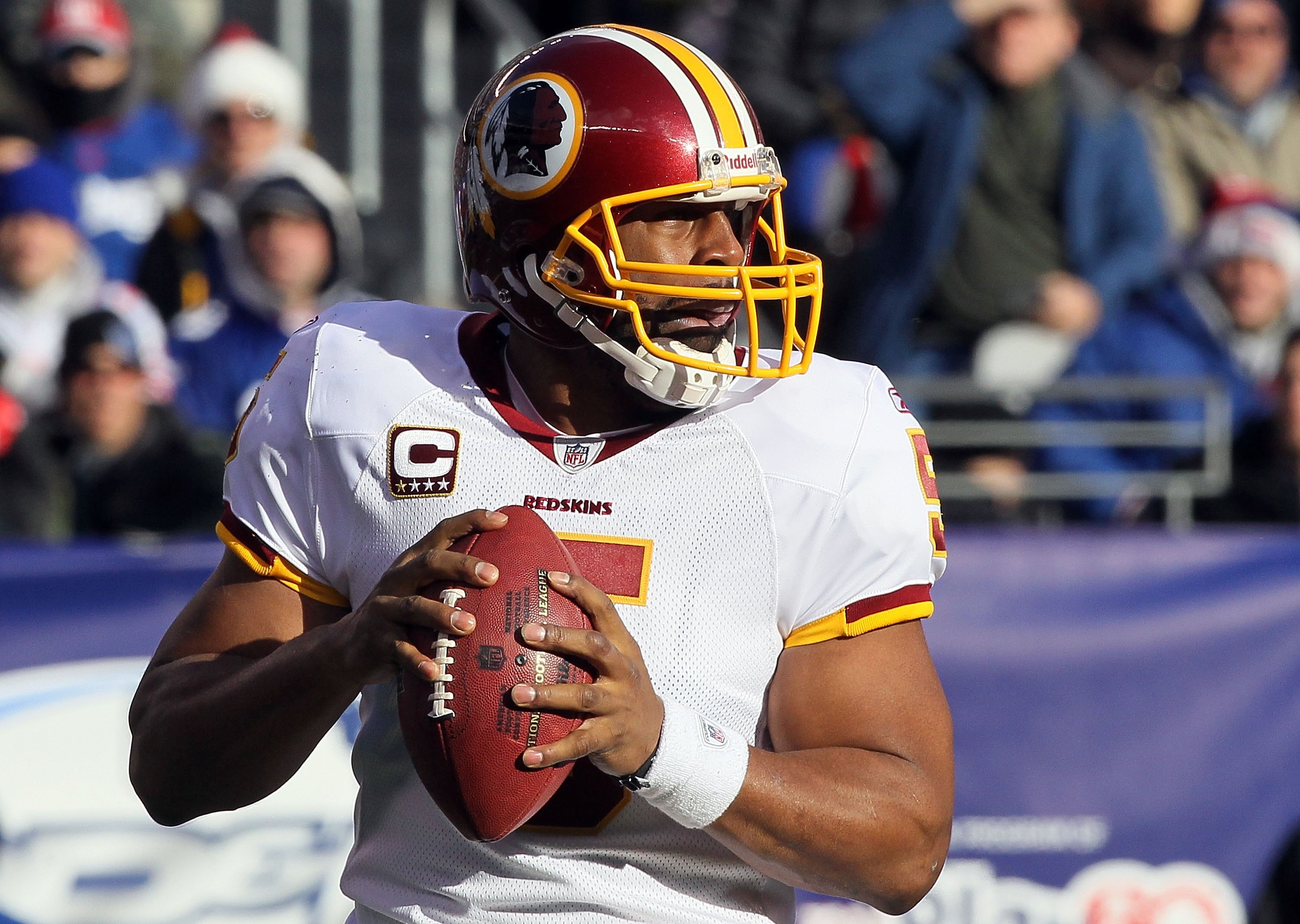 EAST RUTHERFORD, NJ - DECEMBER 05: Donovan McNabb #5 of the Washington Redskins looks to throw a pass against the New York Giants on December 5, 2010 at the New Meadowlands Stadium in East Rutherford, New Jersey. The Giants defeated the Redskins 31-7. ( EAST RUTHERFORD, NJ - DECEMBER 05: Donovan McNabb #5 of the Washington Redskins looks to throw a pass against the New York Giants on December 5, 2010 at the New Meadowlands Stadium in East Rutherford, New Jersey. The Giants defeated the Redskins 31-7. (