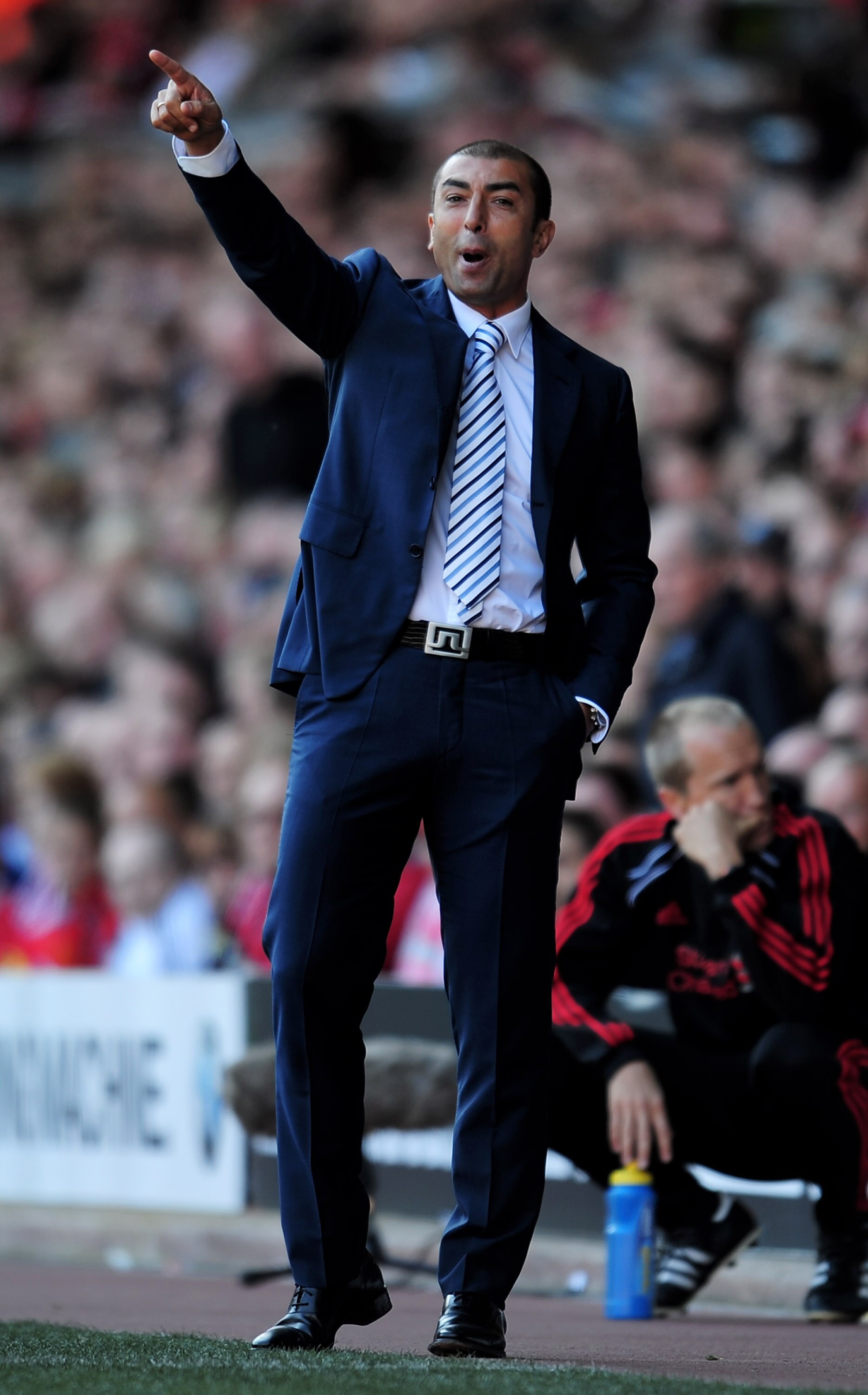 LIVERPOOL, ENGLAND - AUGUST 29:  West Bromwich Albion Manager Roberto Di Matteo issues instructions during the Barclays Premier League match between Liverpool and West Bromwich Albion at Anfield on August 29, 2010 in Liverpool, England.  (Photo by Shaun B