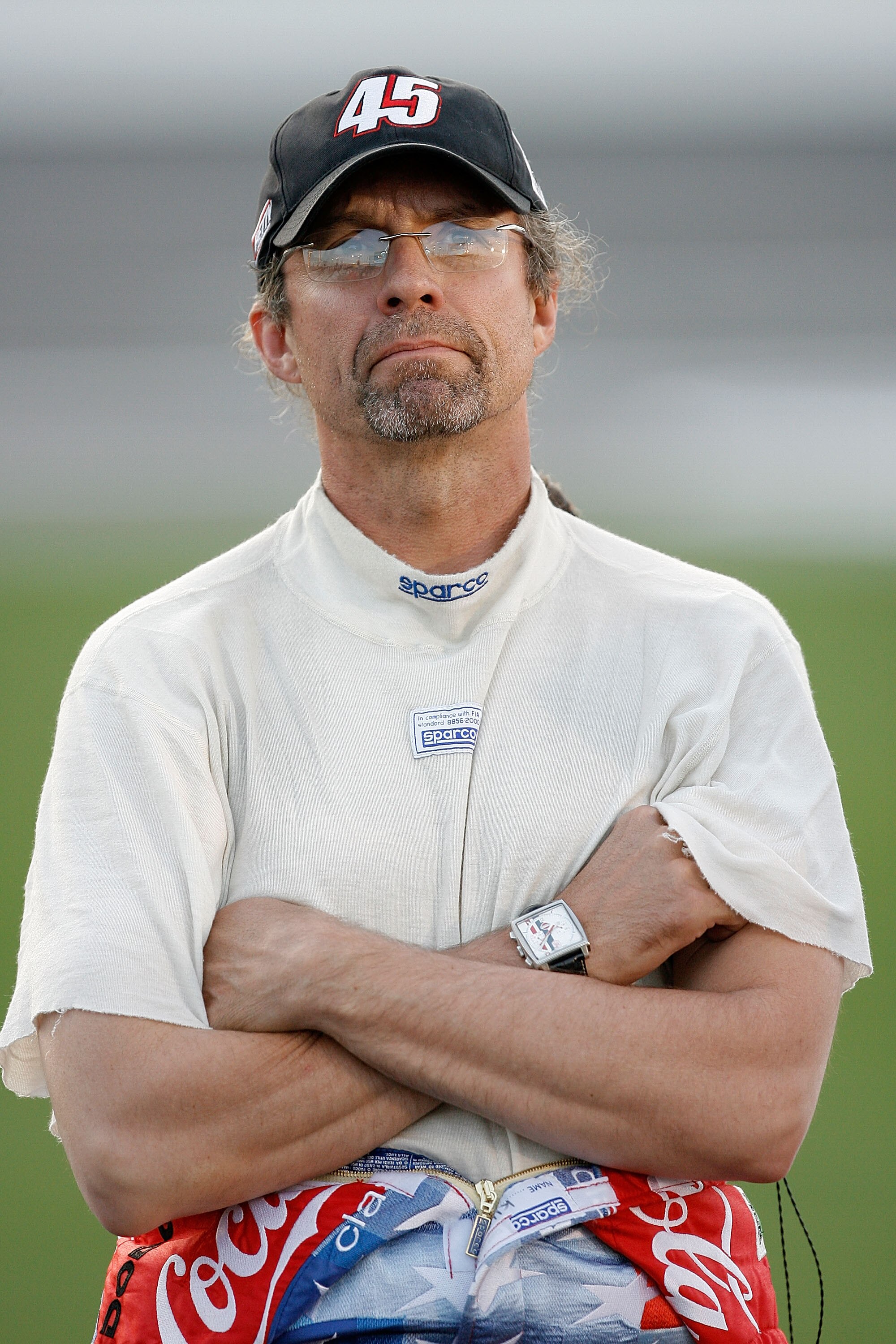 CONCORD, NC - MAY 22: Kyle Petty, driver of the #45 Coca-Cola Dodge, stands on the grid during qualifying for the NASCAR Sprint Cup Series Coca-Cola 600 on May 22, 2008 at Lowe's Motor Speedway in Concord, North Carolina.  (Photo by Streeter Lecka/Getty I
