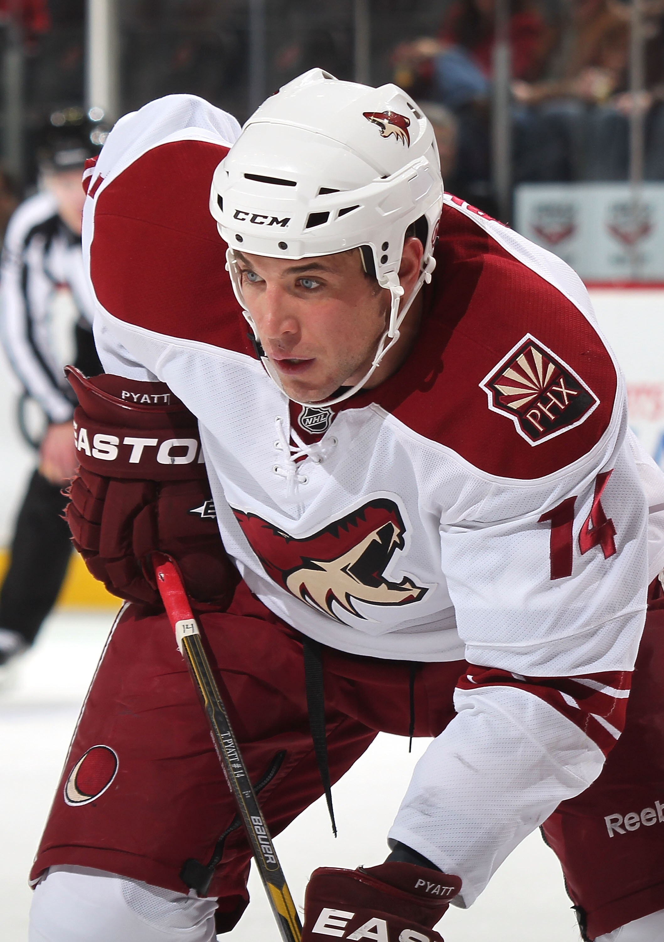 NEWARK, NJ - DECEMBER 15: Taylor Pyatt #14 of the Phoenix Coyotes waits for a faceoff during a hockey game against the New Jersey Devils at the Prudential Center on December 15, 2010 in Newark, New Jersey.  (Photo by Paul Bereswill/Getty Images)
