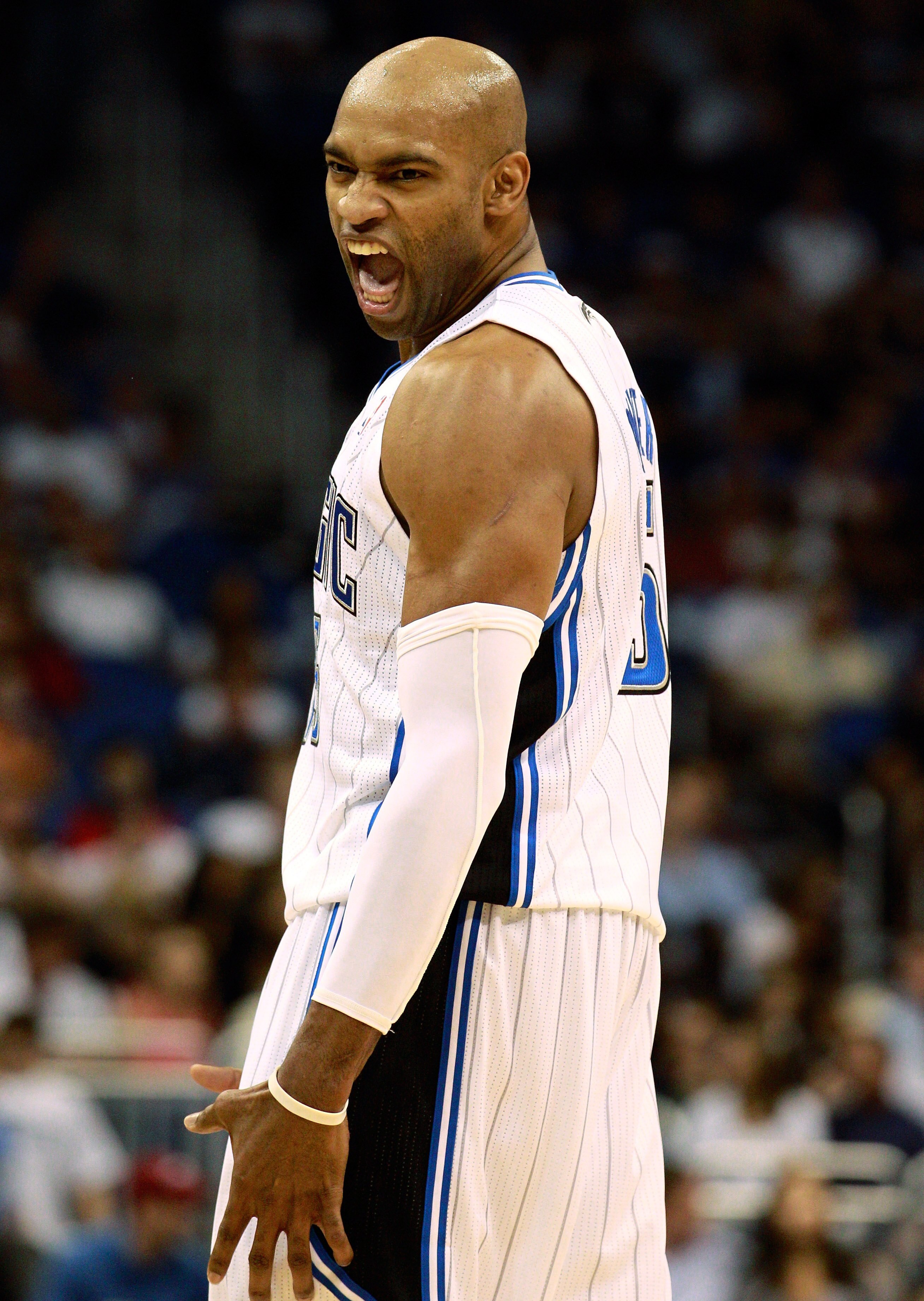 ORLANDO, FL - OCTOBER 10:  Vince Carter #15 of the Orlando Magic reacts after a basket during the game against the New Orleans Hornets at Amway Arena on October 10, 2010 in Orlando, Florida. NOTE TO USER: User expressly acknowledges and agrees that, by do