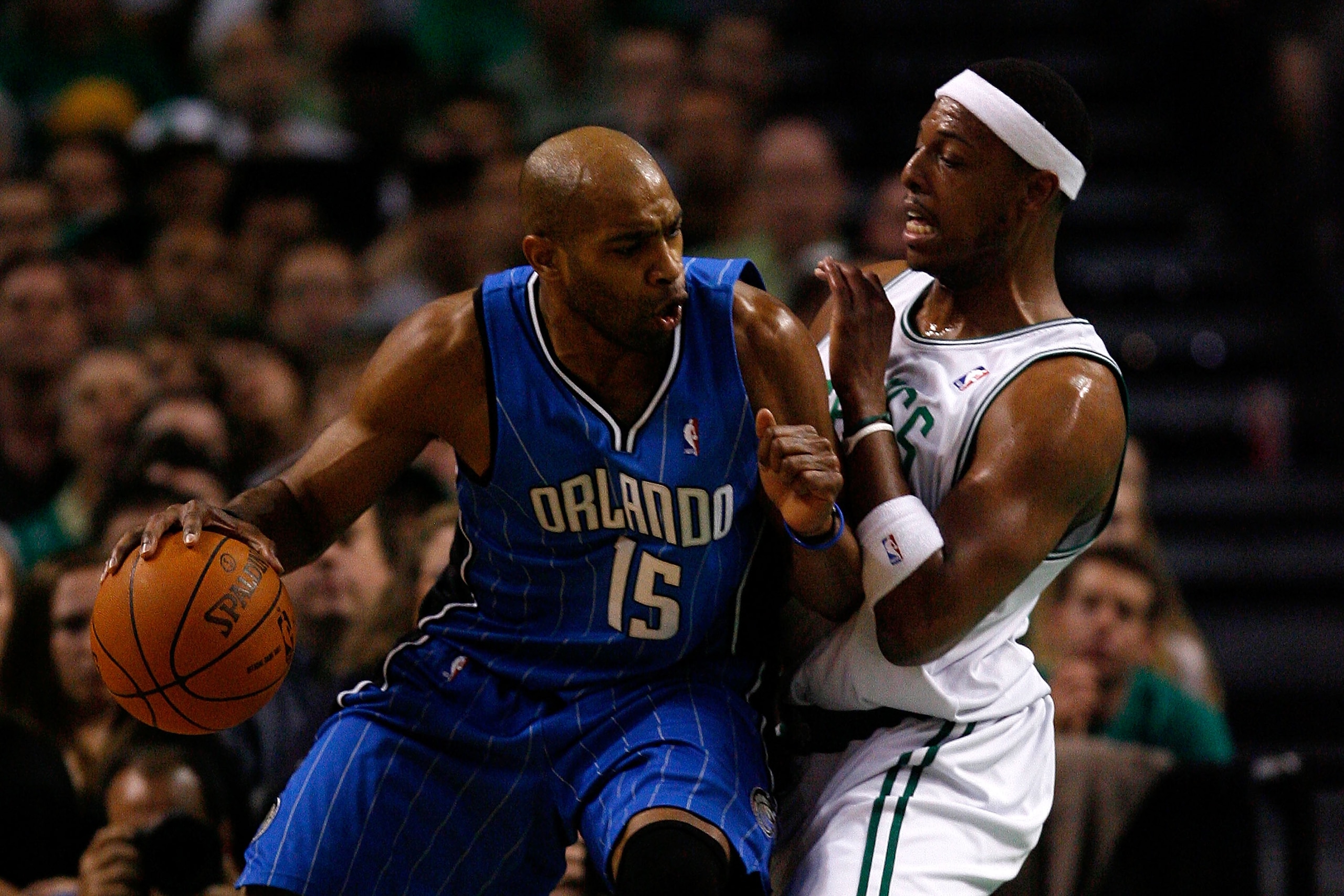 BOSTON - MAY 24: Vince Carter #15 of the Orlando Magic dribbles against Paul Pierce #34 of the Boston Celtics in Game Four of the Eastern Conference Finals during the 2010 NBA Playoffs at TD Banknorth Garden on May 24, 2010 in Boston, Massachusetts. NOT BOSTON - MAY 24: Vince Carter #15 of the Orlando Magic dribbles against Paul Pierce #34 of the Boston Celtics in Game Four of the Eastern Conference Finals during the 2010 NBA Playoffs at TD Banknorth Garden on May 24, 2010 in Boston, Massachusetts. NOT