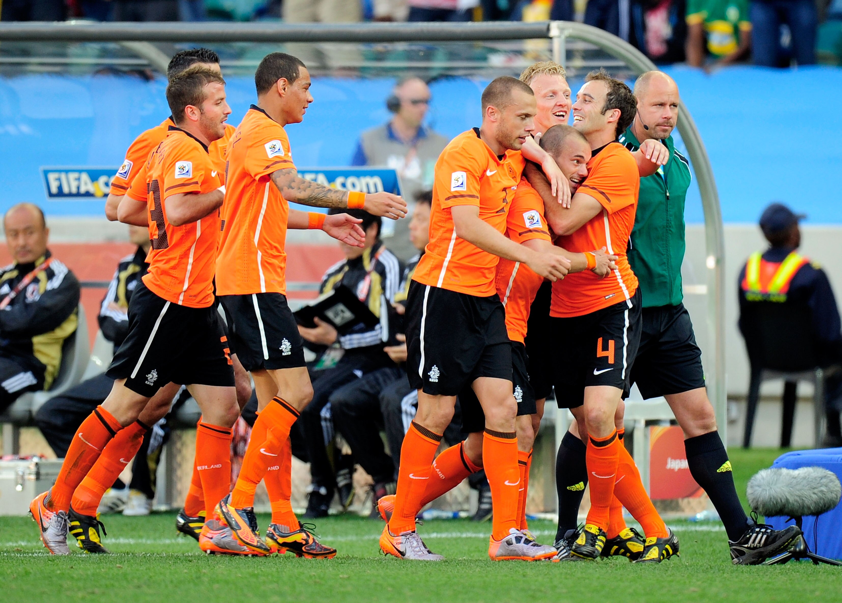 DURBAN, SOUTH AFRICA - JUNE 19:  Wesley Sneijder of the Netherlands (R) celebrates scoring the opening goal with team mates during the 2010 FIFA World Cup South Africa Group E match between Netherlands and Japan at Durban Stadium on June 19, 2010 in Durba