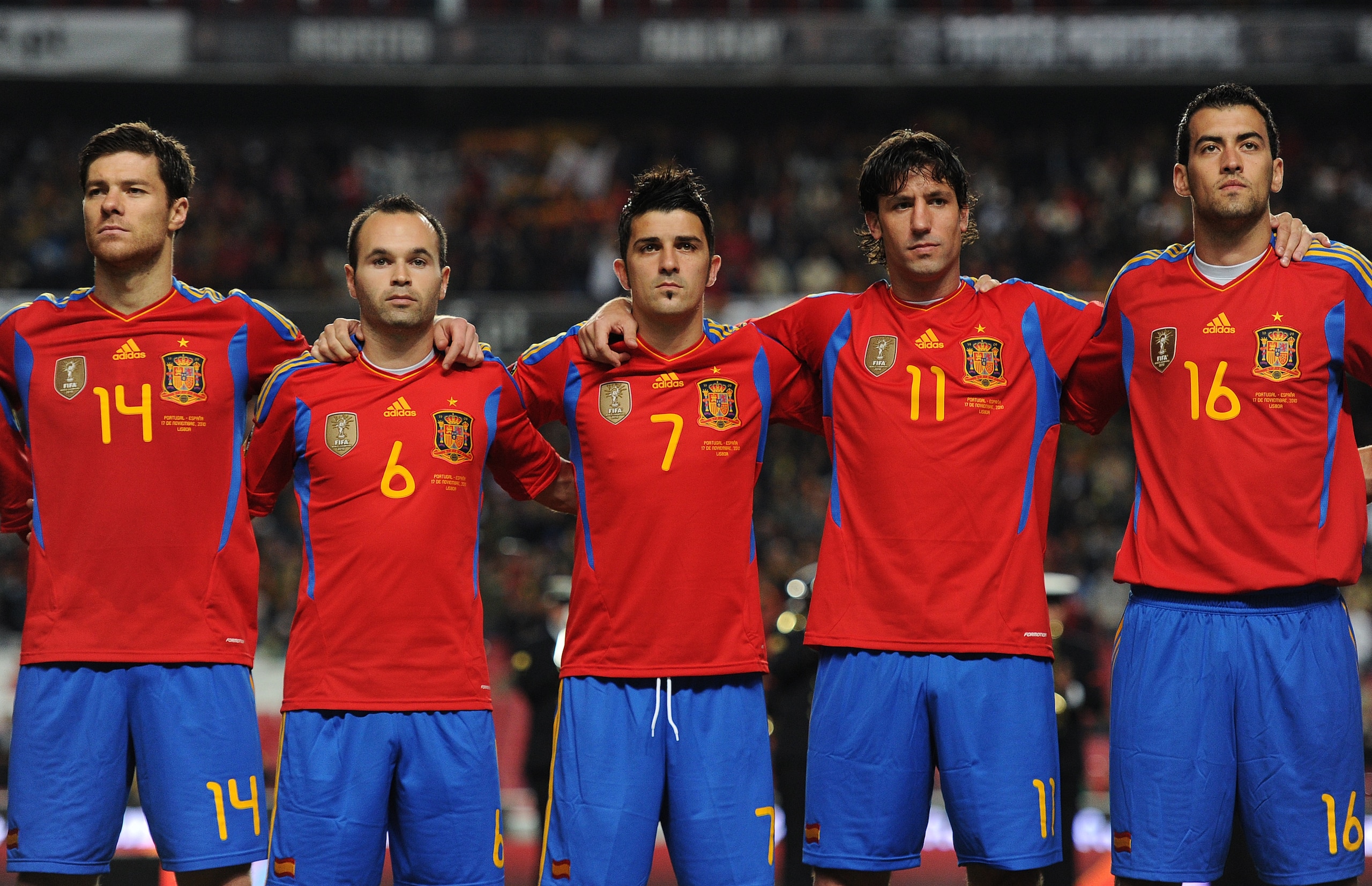 LISBON, PORTUGAL - NOVEMBER 17: (L-R) Xabi Alonso, Andres Iniesta, David Villa, Joan Capdevila and Sergio Busquets of Spain listen to their countries national anthems during the International Friendly match between Portugal and Spain at the Estadio da Lu LISBON, PORTUGAL - NOVEMBER 17: (L-R) Xabi Alonso, Andres Iniesta, David Villa, Joan Capdevila and Sergio Busquets of Spain listen to their countries national anthems during the International Friendly match between Portugal and Spain at the Estadio da Lu